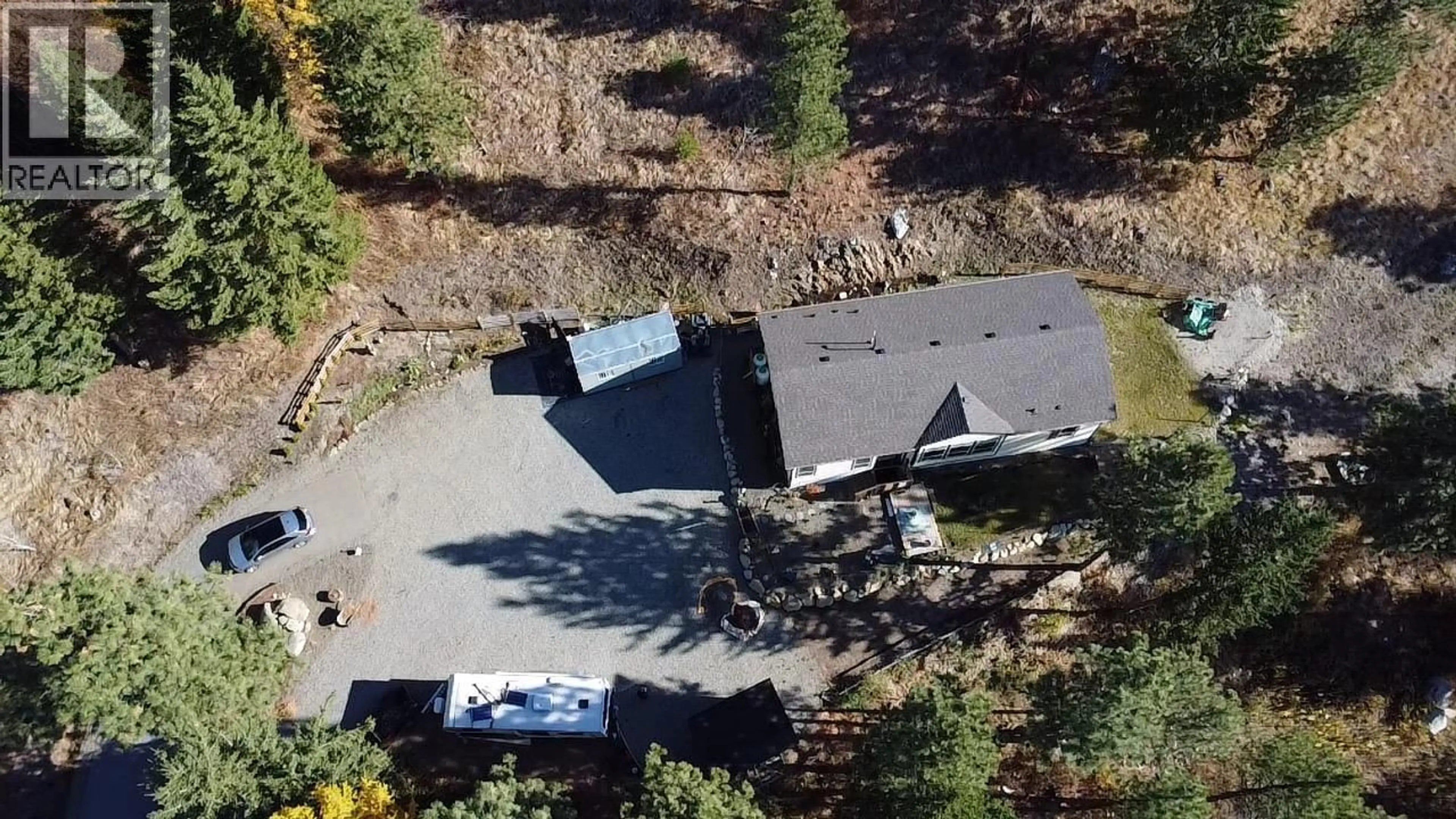 A pic from outside/outdoor area/front of a property/back of a property/a pic from drone, unknown for 1020 BULLMOOSE WAY, Osoyoos British Columbia V0H1V6
