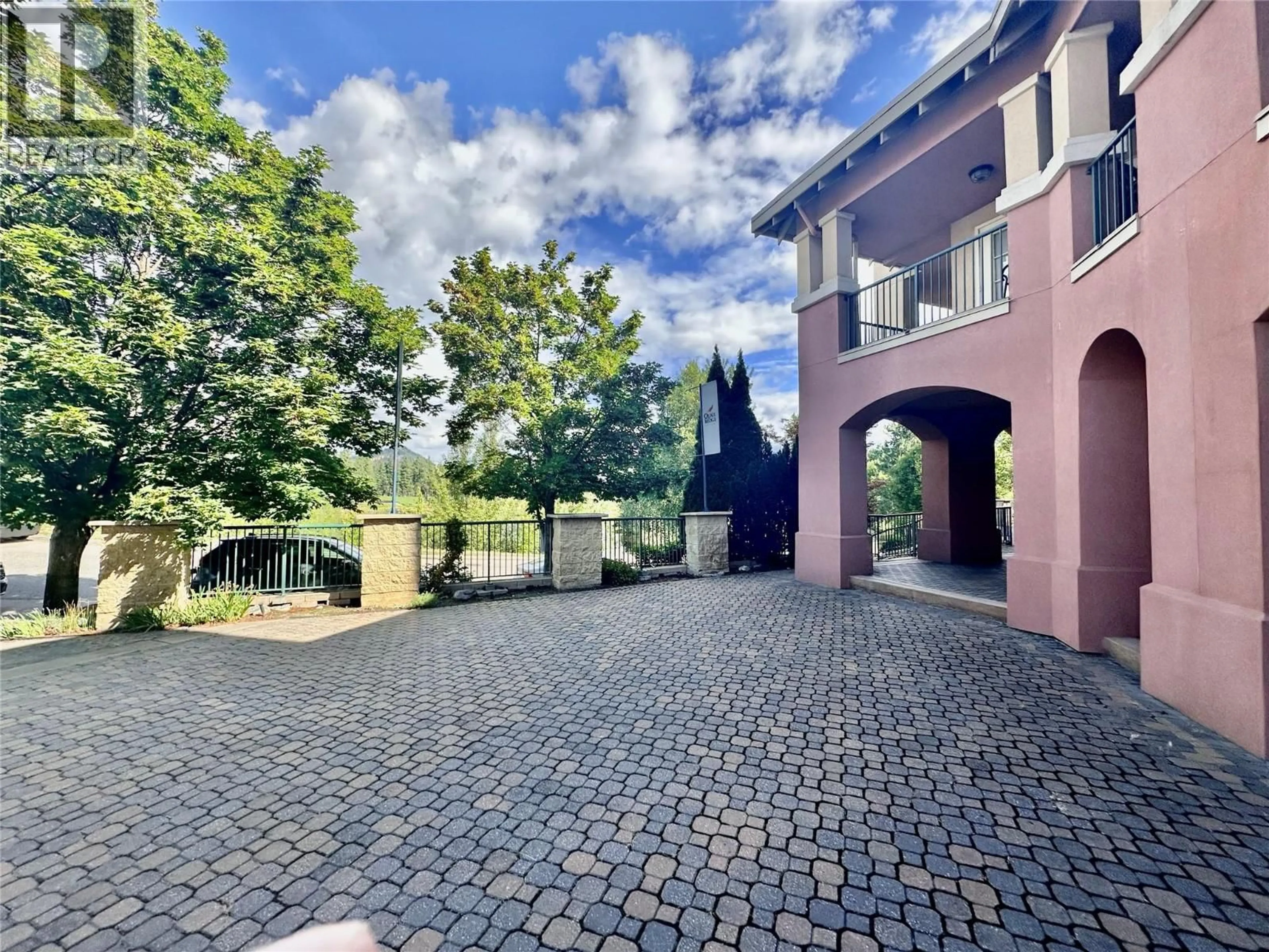 A pic from outside/outdoor area/front of a property/back of a property/a pic from drone, water/lake/river/ocean view for 6 - 3185 VIA CENTRALE DRIVE, Kelowna British Columbia V1V2A7