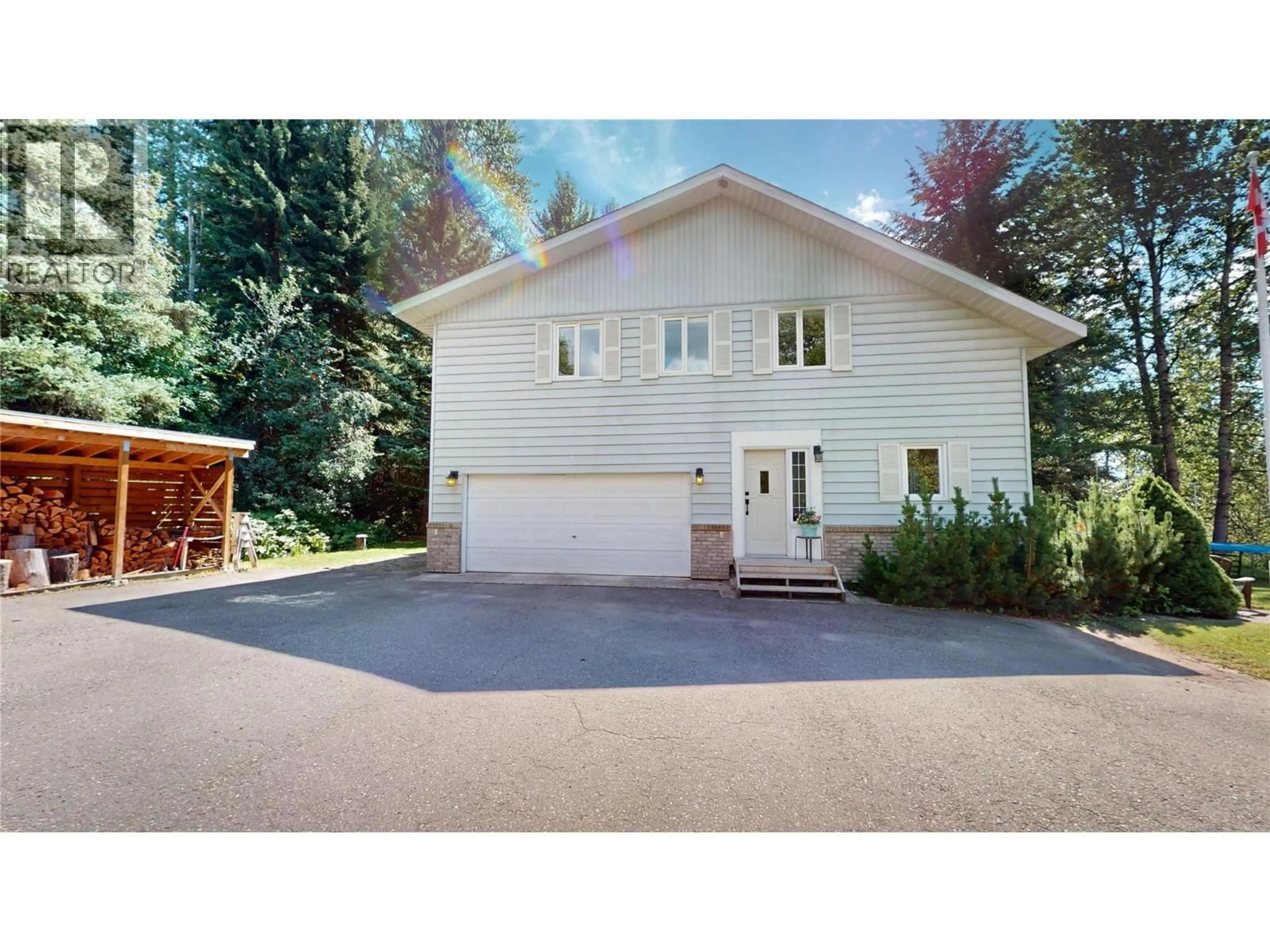 Home with vinyl exterior material, street for 7392 8TH AVENUE, Hosmer British Columbia V0B1M5