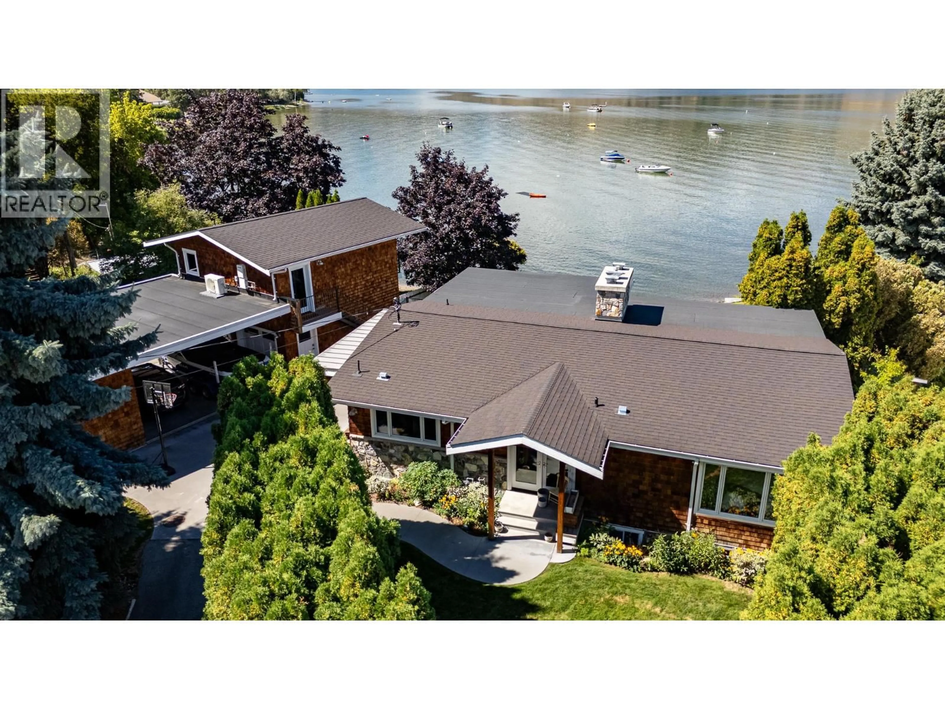 A pic from outside/outdoor area/front of a property/back of a property/a pic from drone, water/lake/river/ocean view for 138 DEVON DRIVE, Okanagan Falls British Columbia V0H1R5