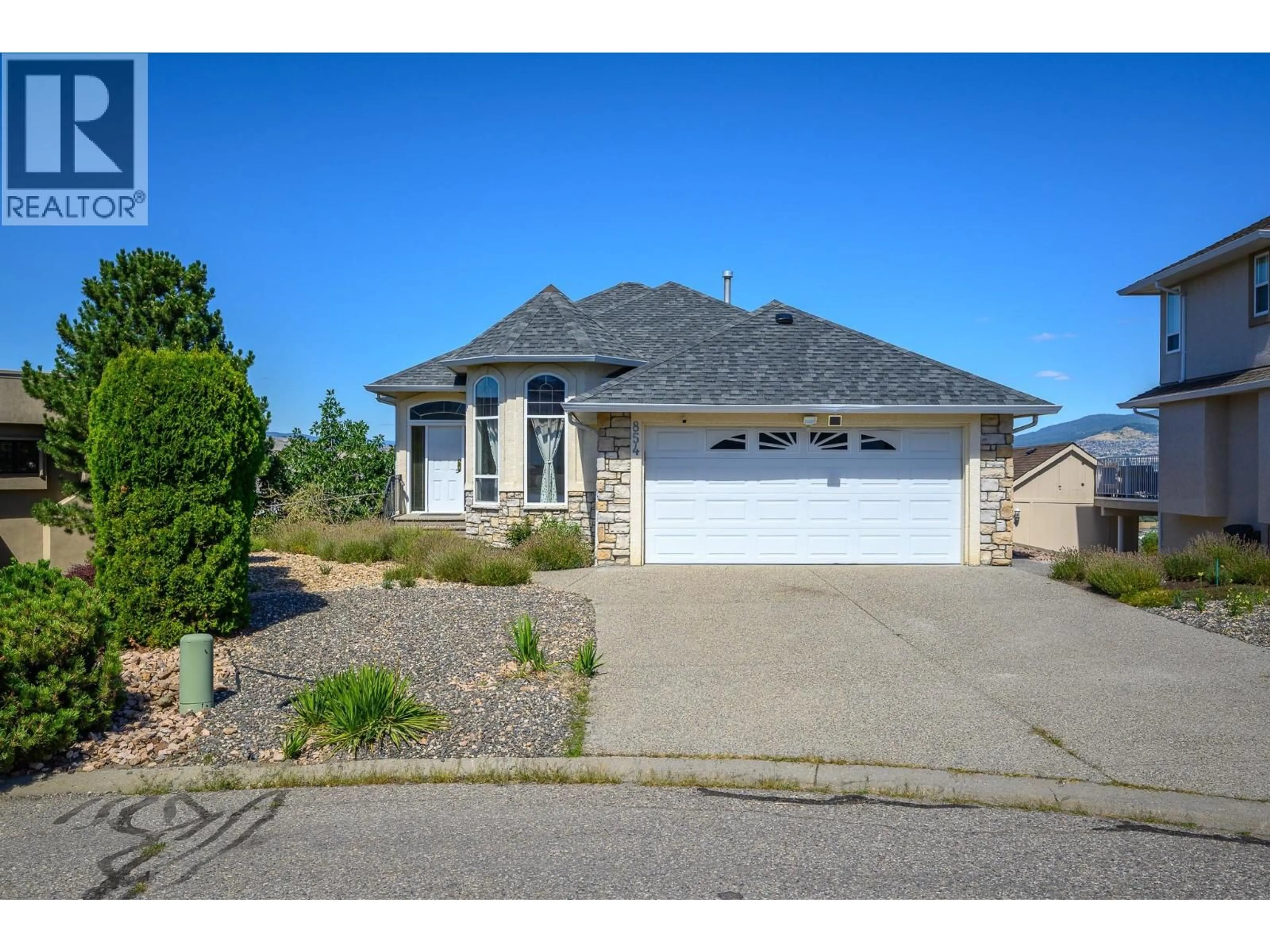 Home with brick exterior material, street for 854 MT BULMAN PLACE, Vernon British Columbia V1B2Z3