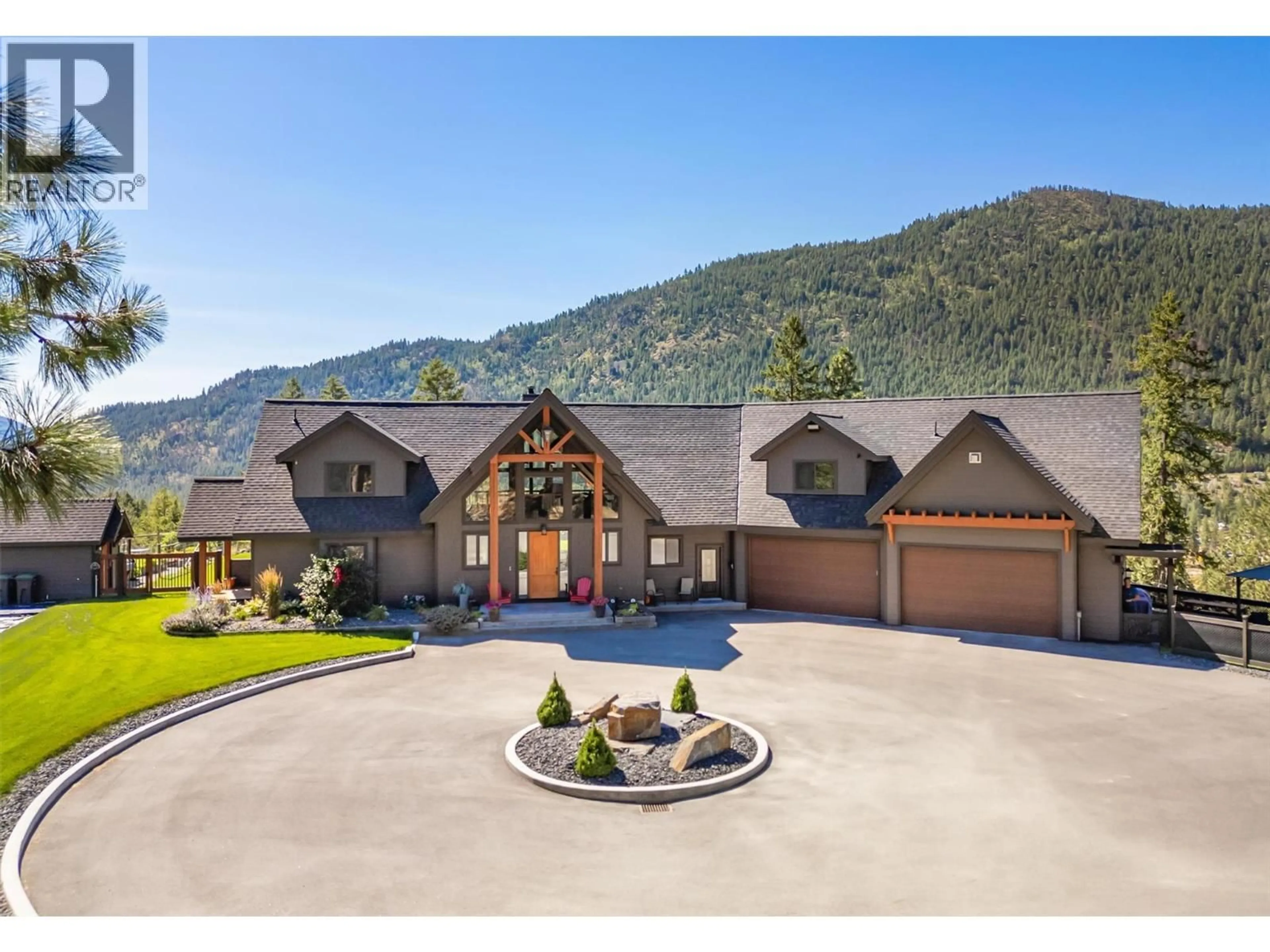 A pic from outside/outdoor area/front of a property/back of a property/a pic from drone, mountain view for 4495 MAXWELL ROAD, Peachland British Columbia V0H1X3