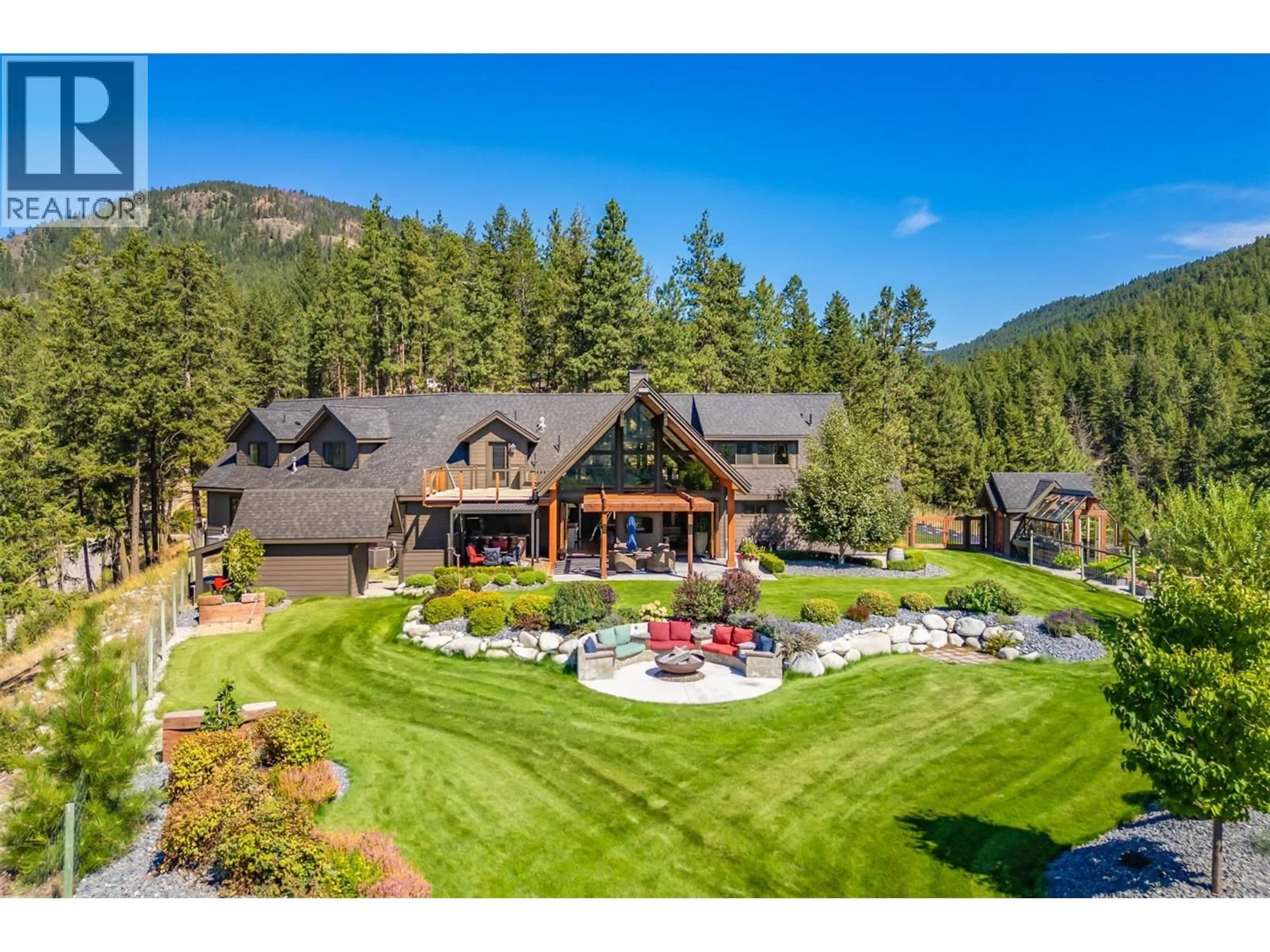 A pic from outside/outdoor area/front of a property/back of a property/a pic from drone, mountain view for 4495 MAXWELL ROAD, Peachland British Columbia V0H1X3