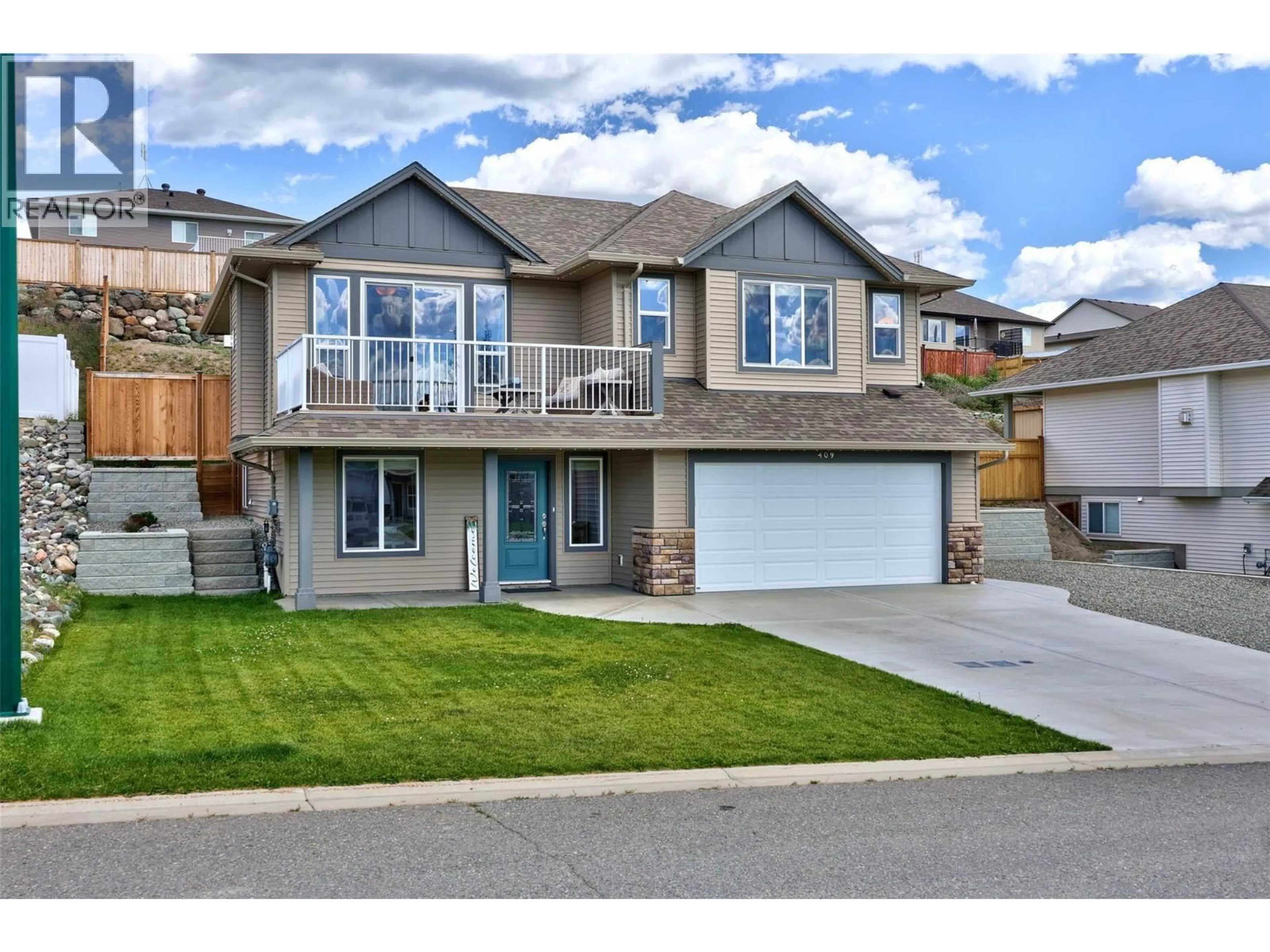 Home with vinyl exterior material, street for 409 DALADON DRIVE, Logan Lake British Columbia V0K1W0