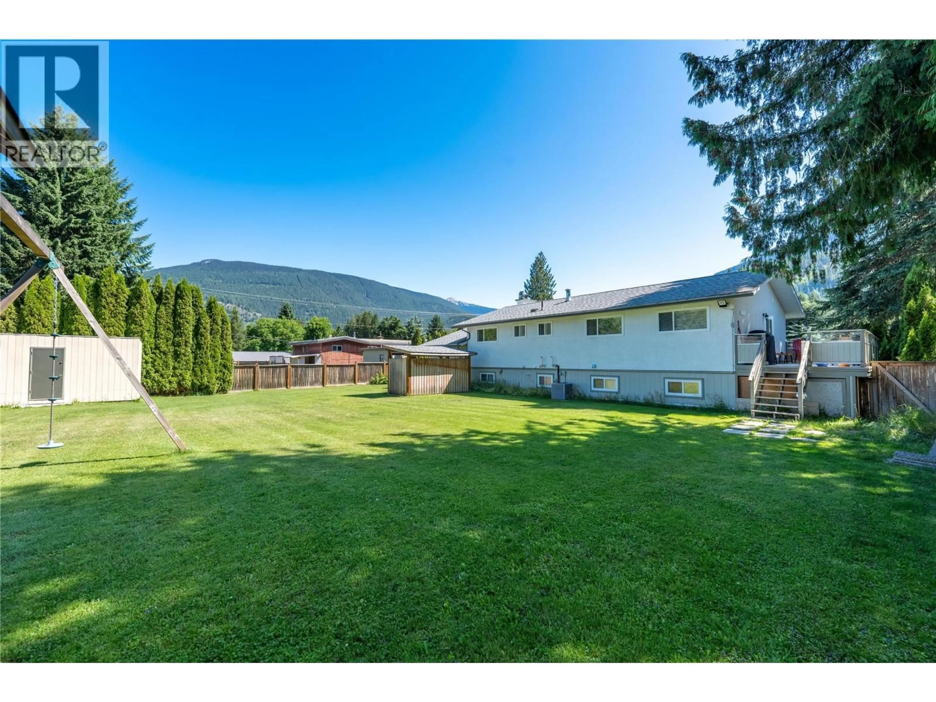 A pic from outside/outdoor area/front of a property/back of a property/a pic from drone, mountain view for 1727 TILLEN ROAD, Revelstoke British Columbia V0E2S1