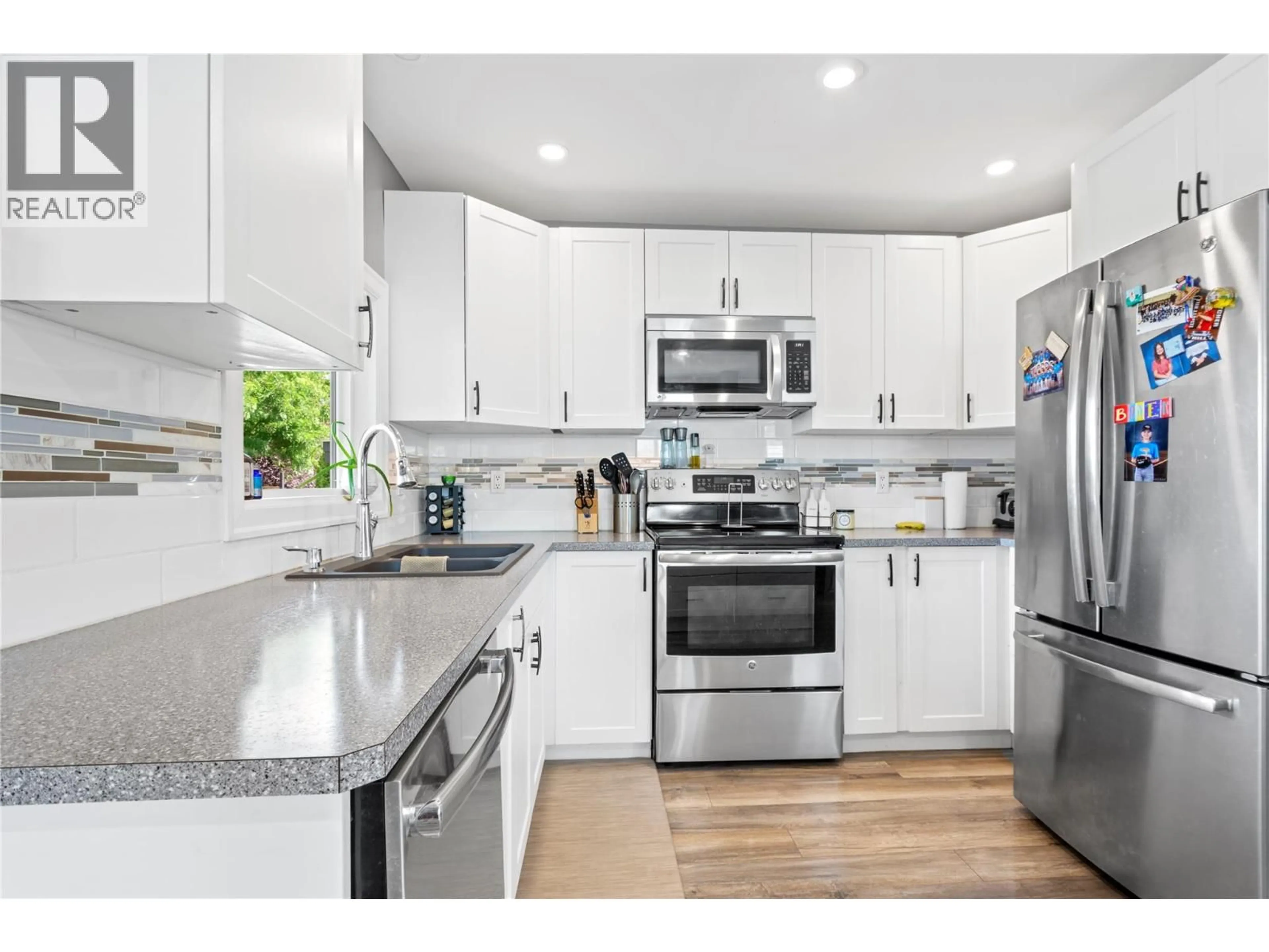 Open concept kitchen, unknown for 117 MCCULLOCH DRIVE, Penticton British Columbia V2A3P6