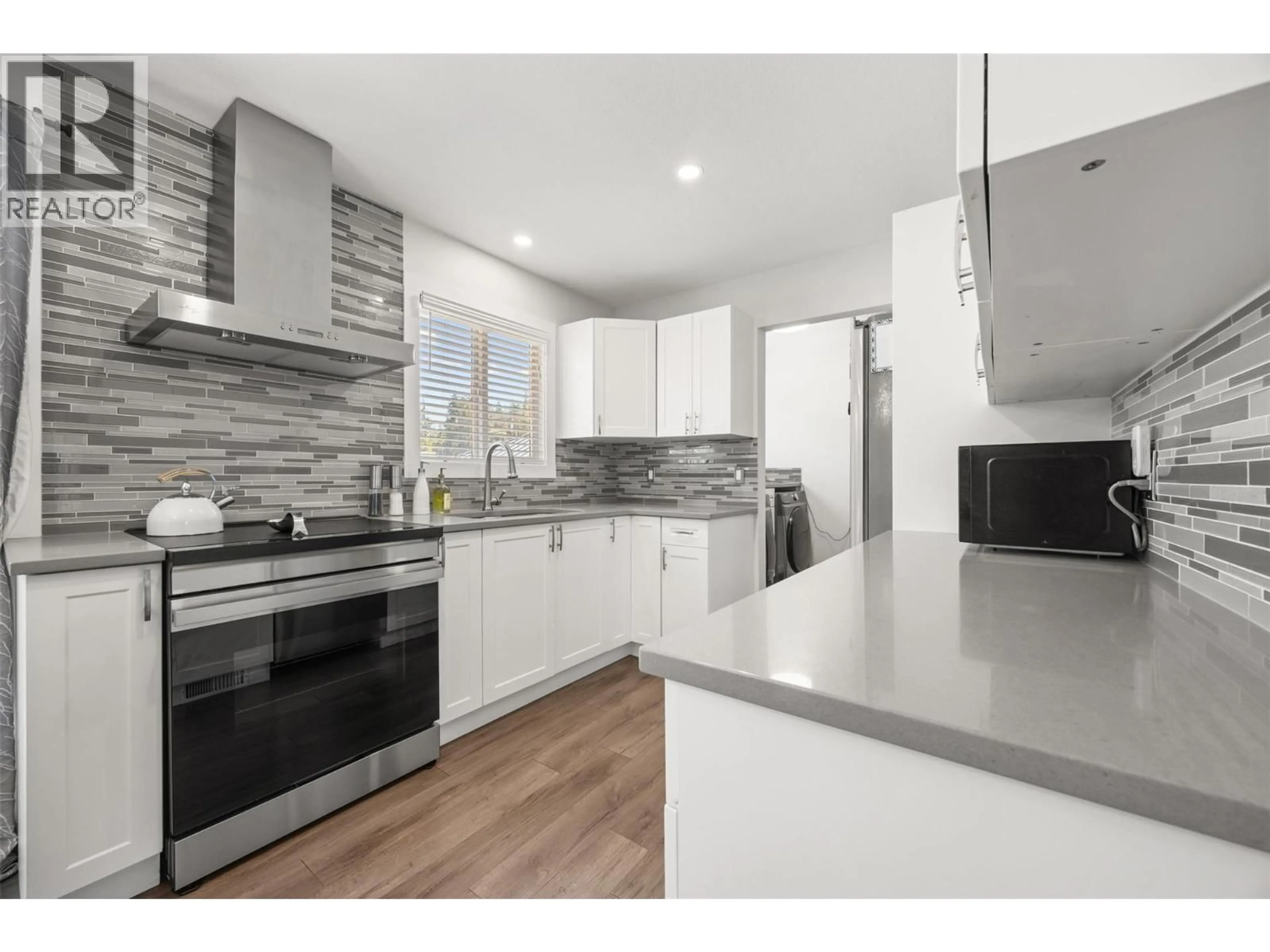 Open concept kitchen, unknown for 1255 RIO DRIVE, Kelowna British Columbia V1V1E2