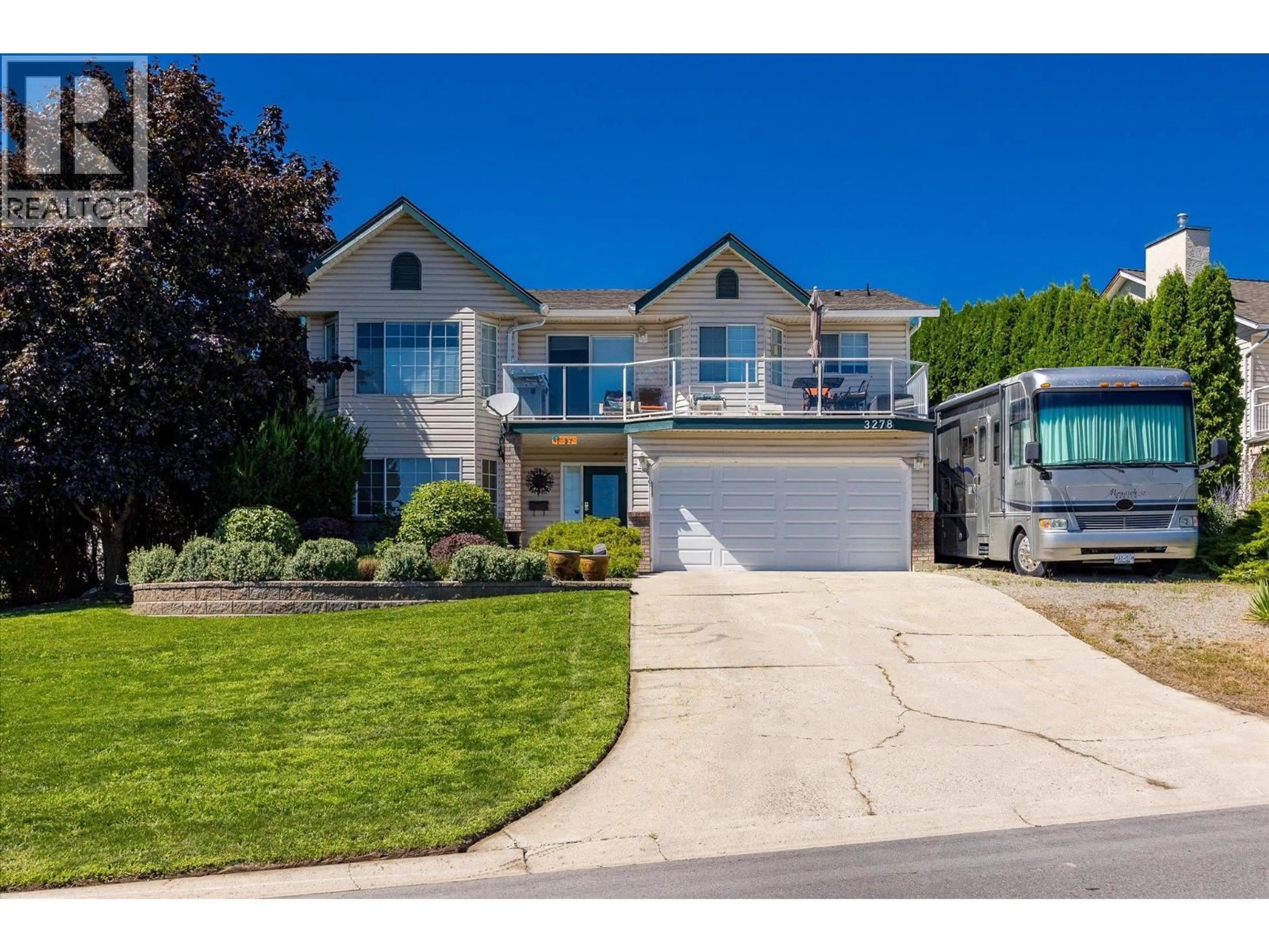 Home with vinyl exterior material, street for 3278 SUNDANCE DRIVE, West Kelowna British Columbia V4T1S4