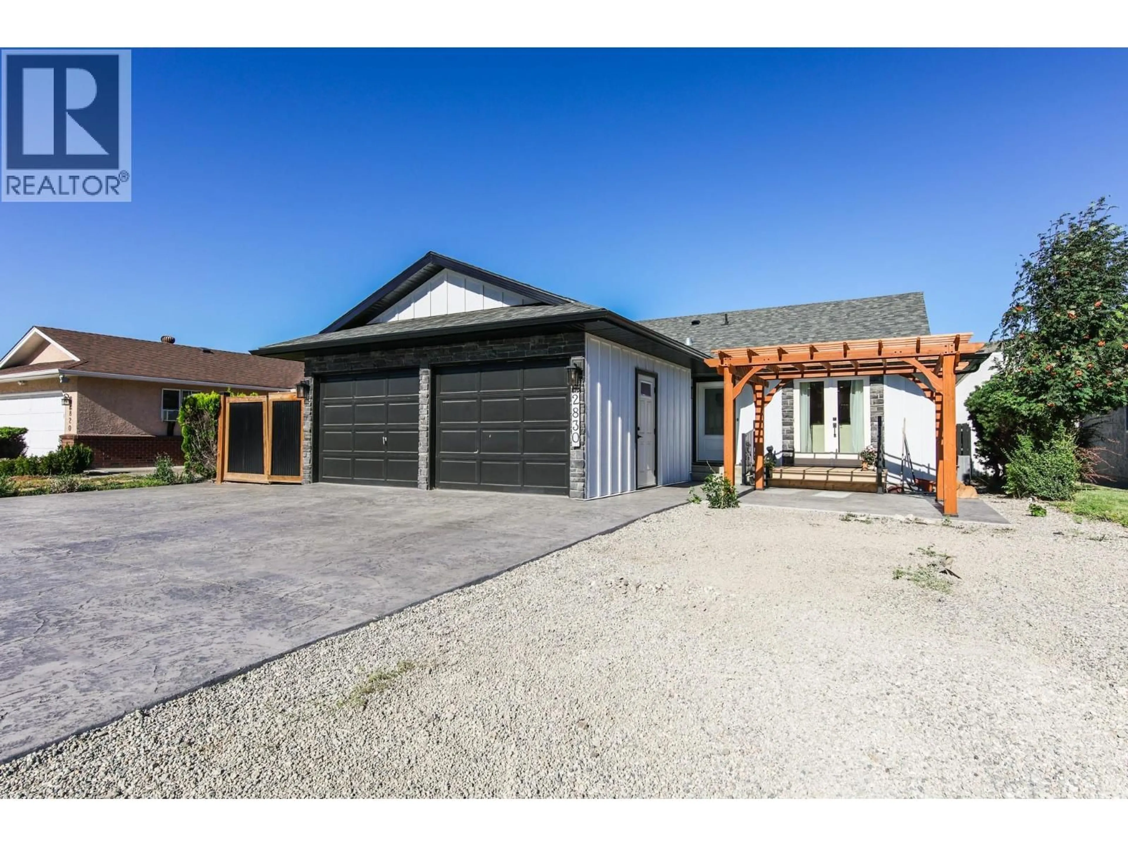 A pic from outside/outdoor area/front of a property/back of a property/a pic from drone, street for 2830 PARIS STREET, Penticton British Columbia V2A8G2