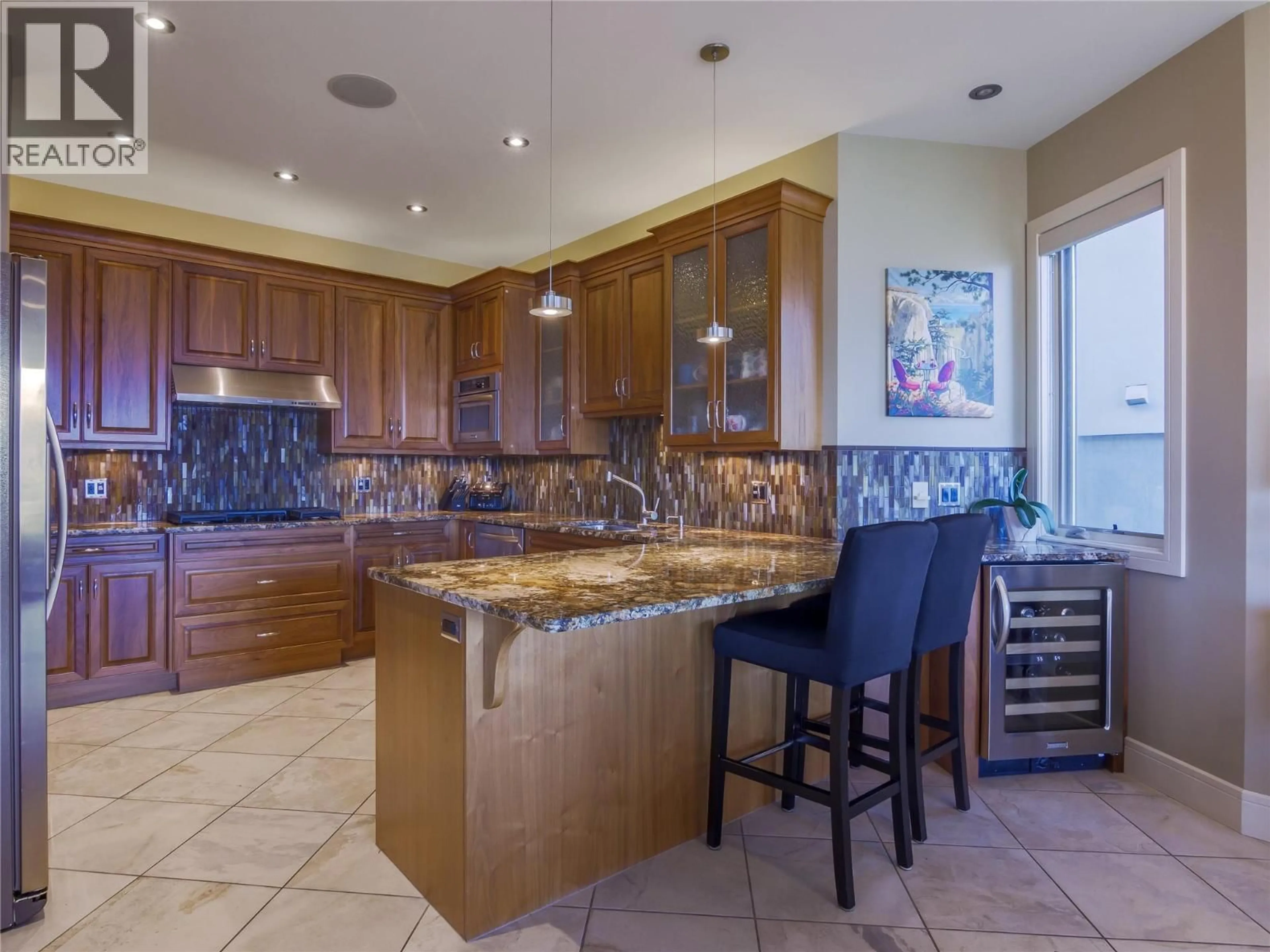 Open concept kitchen, ceramic/tile floor for 2871 PARTRIDGE DRIVE, Penticton British Columbia V2A9E7