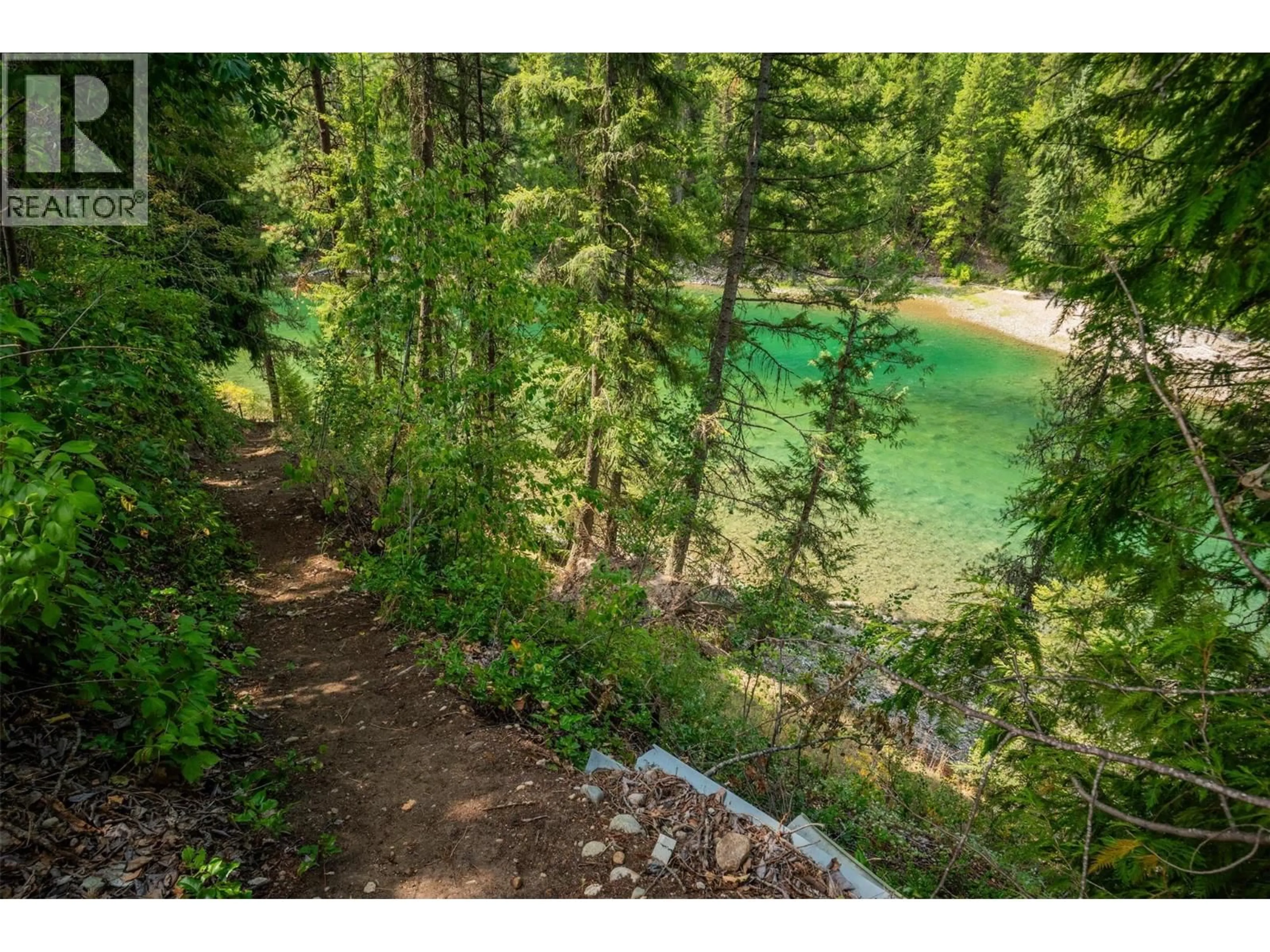 A pic from outside/outdoor area/front of a property/back of a property/a pic from drone, forest/trees view for 2697 OSACHOFF ROAD, South Slocan British Columbia V0G2G0