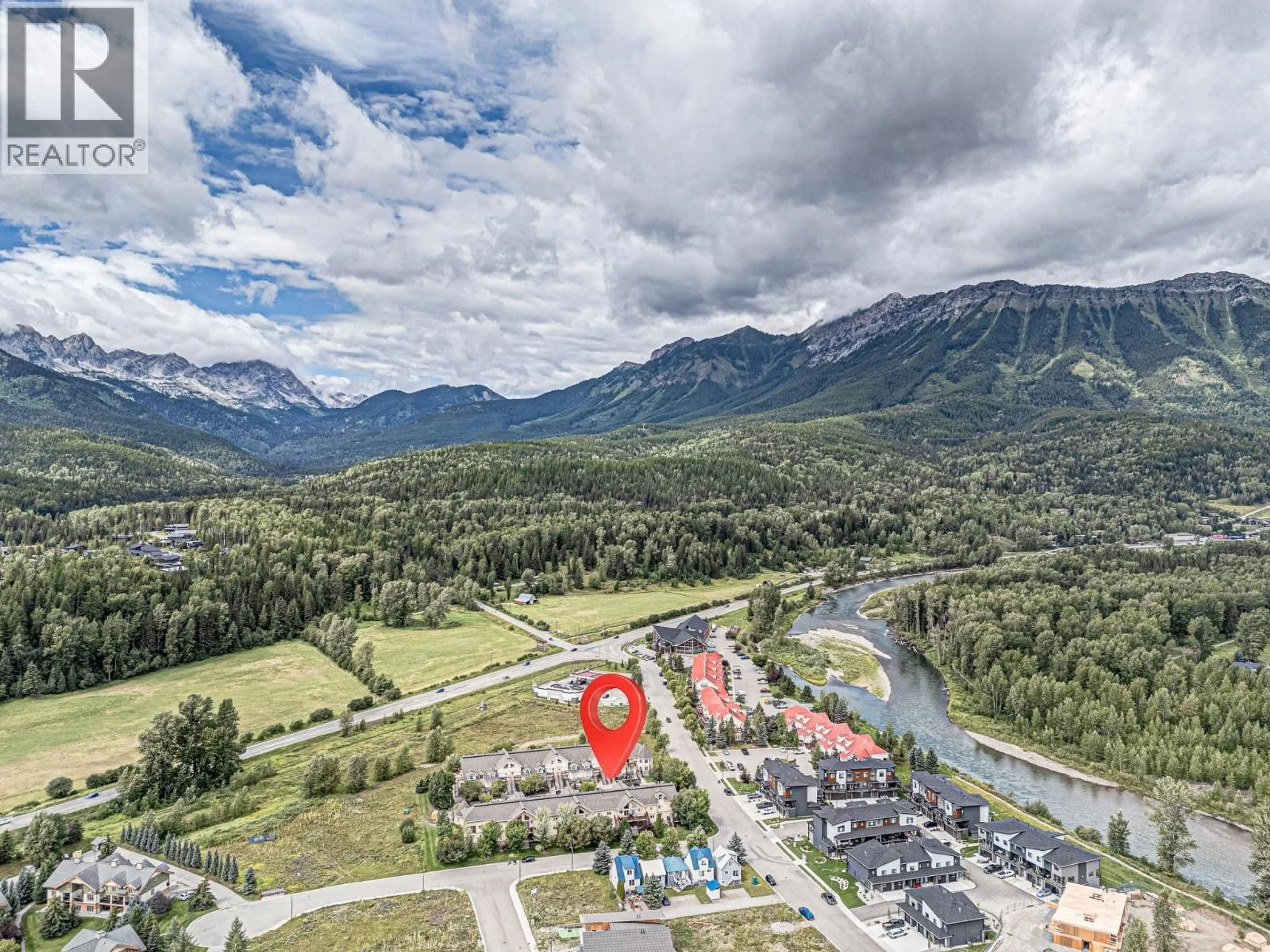 A pic from outside/outdoor area/front of a property/back of a property/a pic from drone, mountain view for 1334-1336 - 1300 RIVERSIDE WAY, Fernie British Columbia V0B1M7
