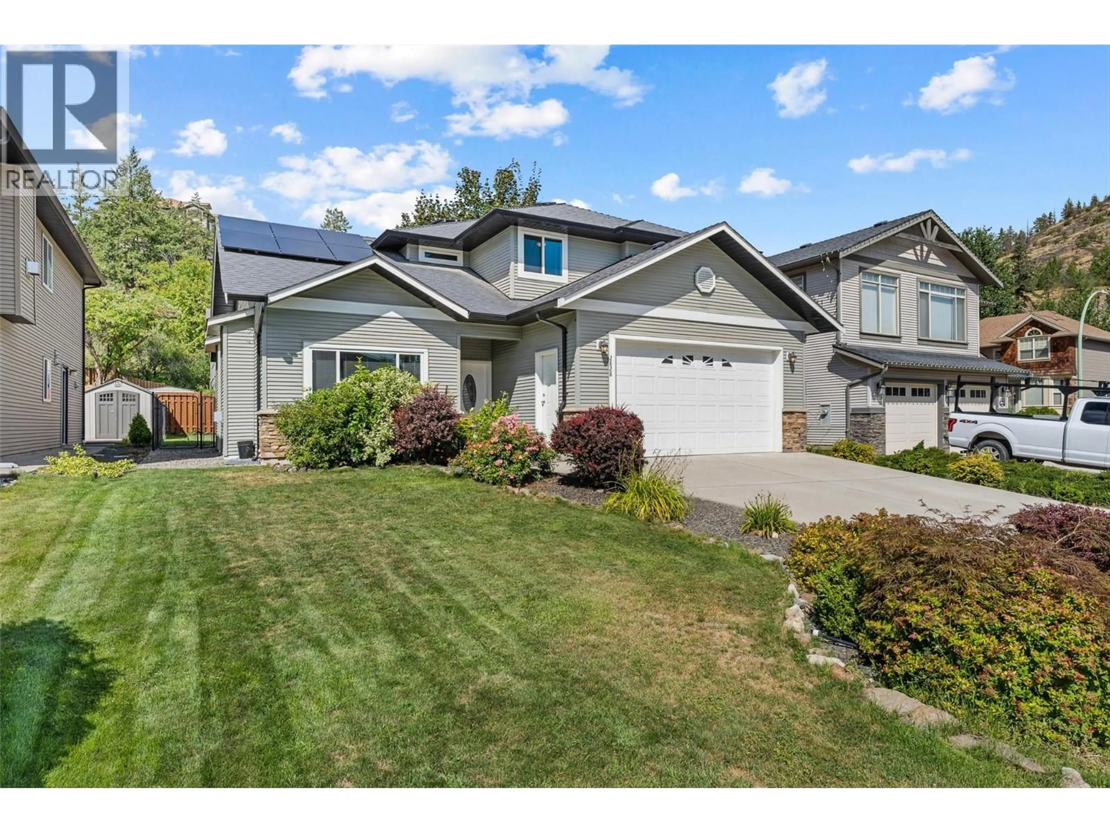 Home with vinyl exterior material, street for 2828 BENTLEY ROAD, West Kelowna British Columbia V4T3A9