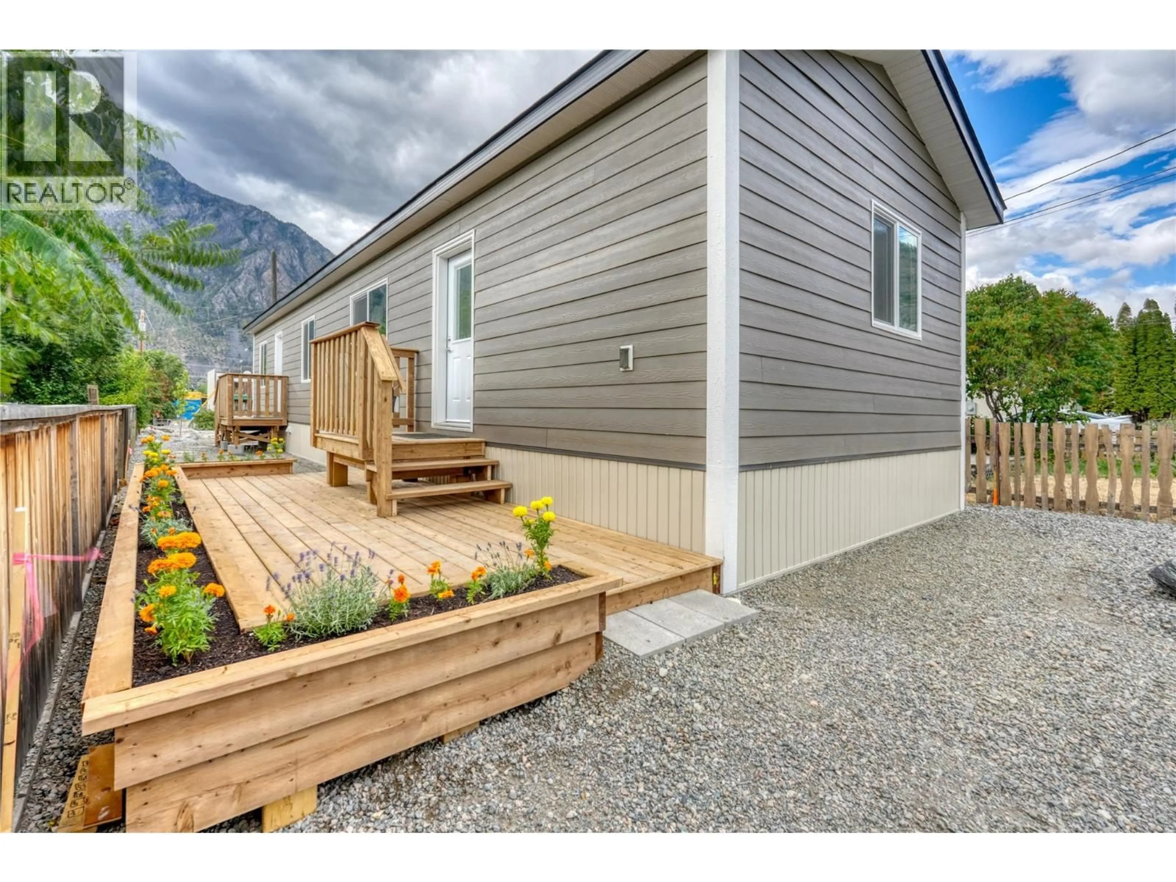 Home with vinyl exterior material, mountain view for 721 6TH AVENUE, Keremeos British Columbia V0X1N3