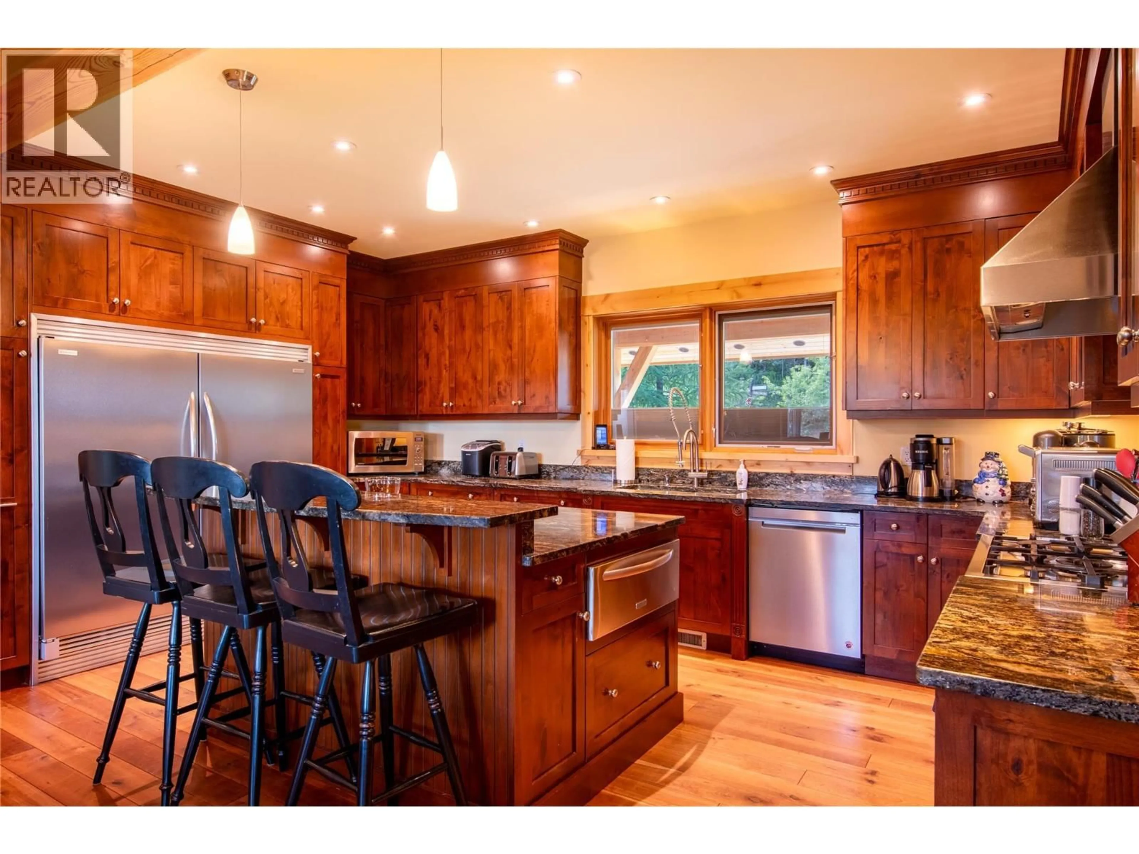 Open concept kitchen, wood/laminate floor for 1590 GOLDEN AVENUE, Golden British Columbia V0A1H0
