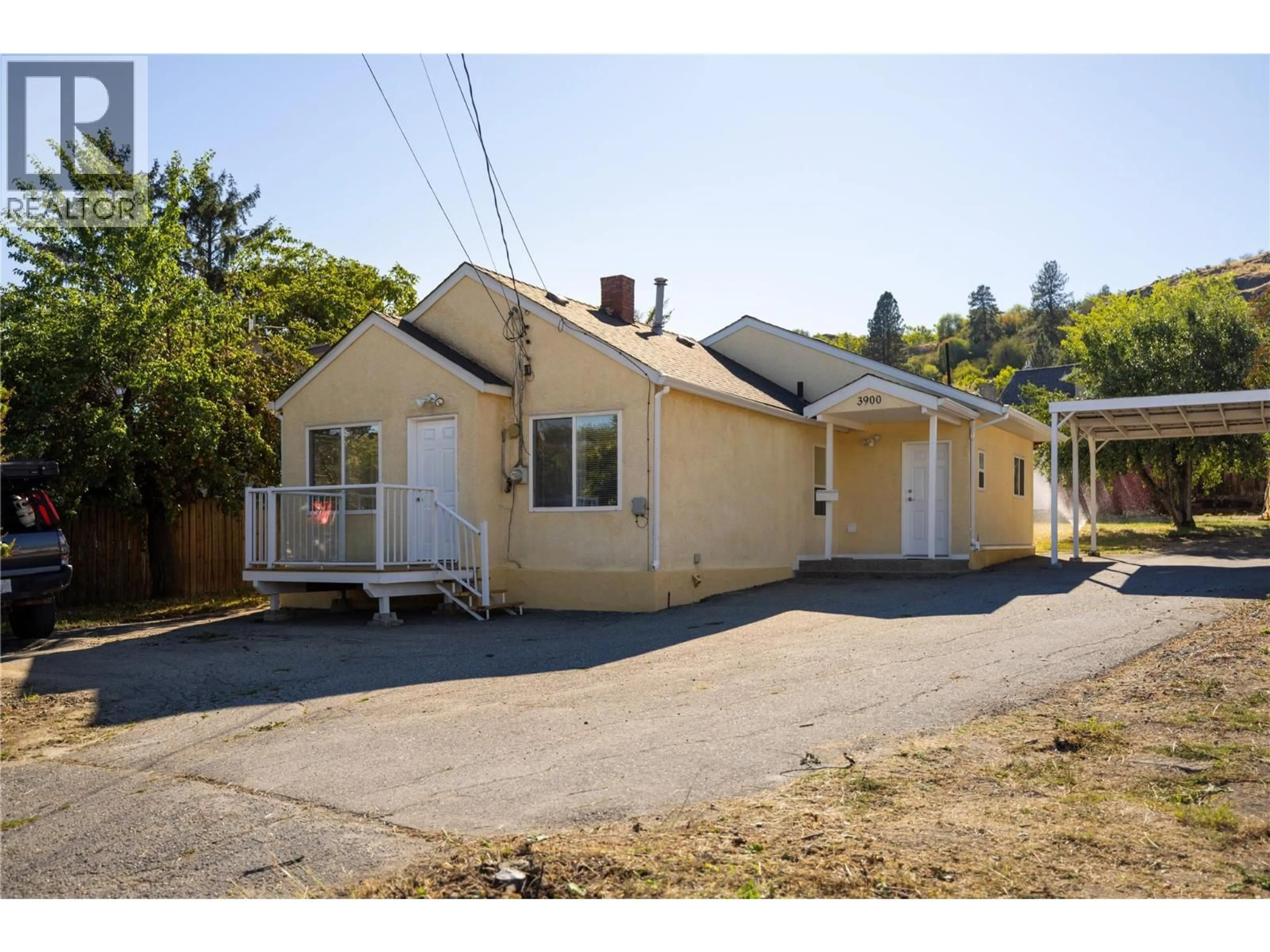 A pic from outside/outdoor area/front of a property/back of a property/a pic from drone, street for 3900 ALEXIS PARK DRIVE, Vernon British Columbia V1T6G9