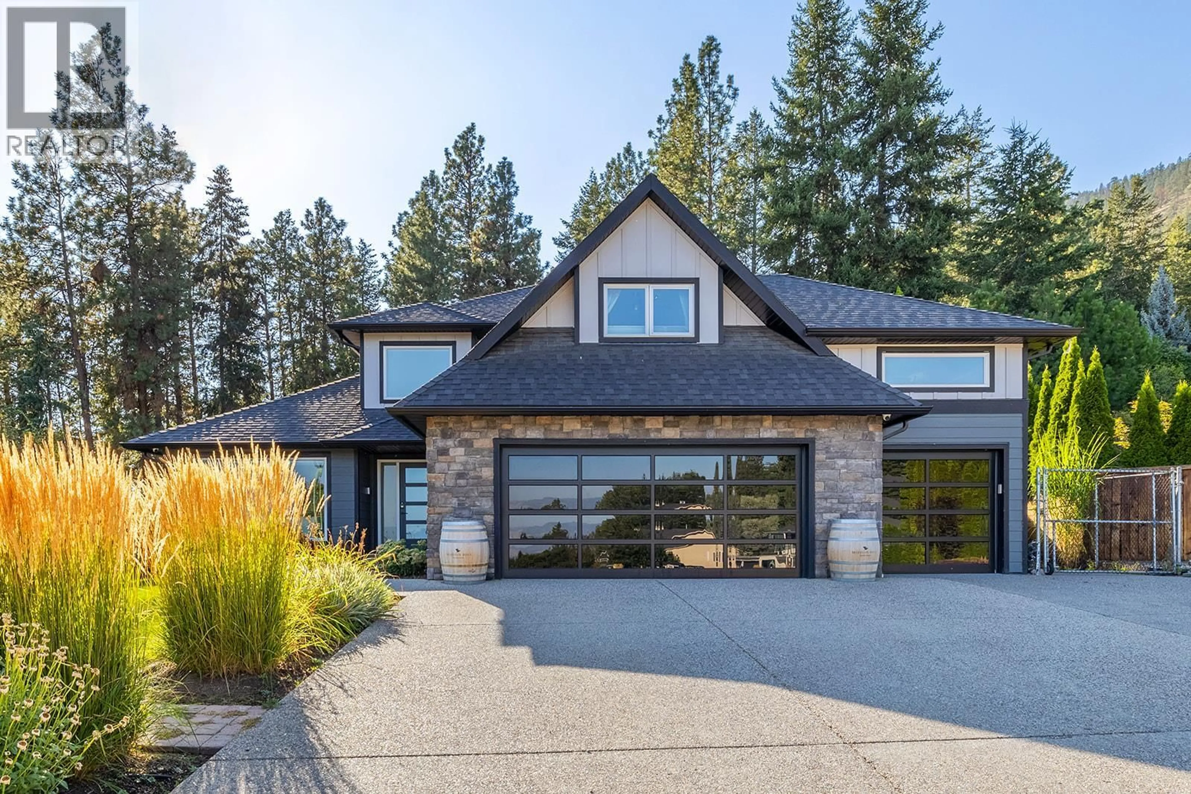 Home with brick exterior material, mountain view for 2227 SHANNON WOODS PLACE, West Kelowna British Columbia V4T2L9