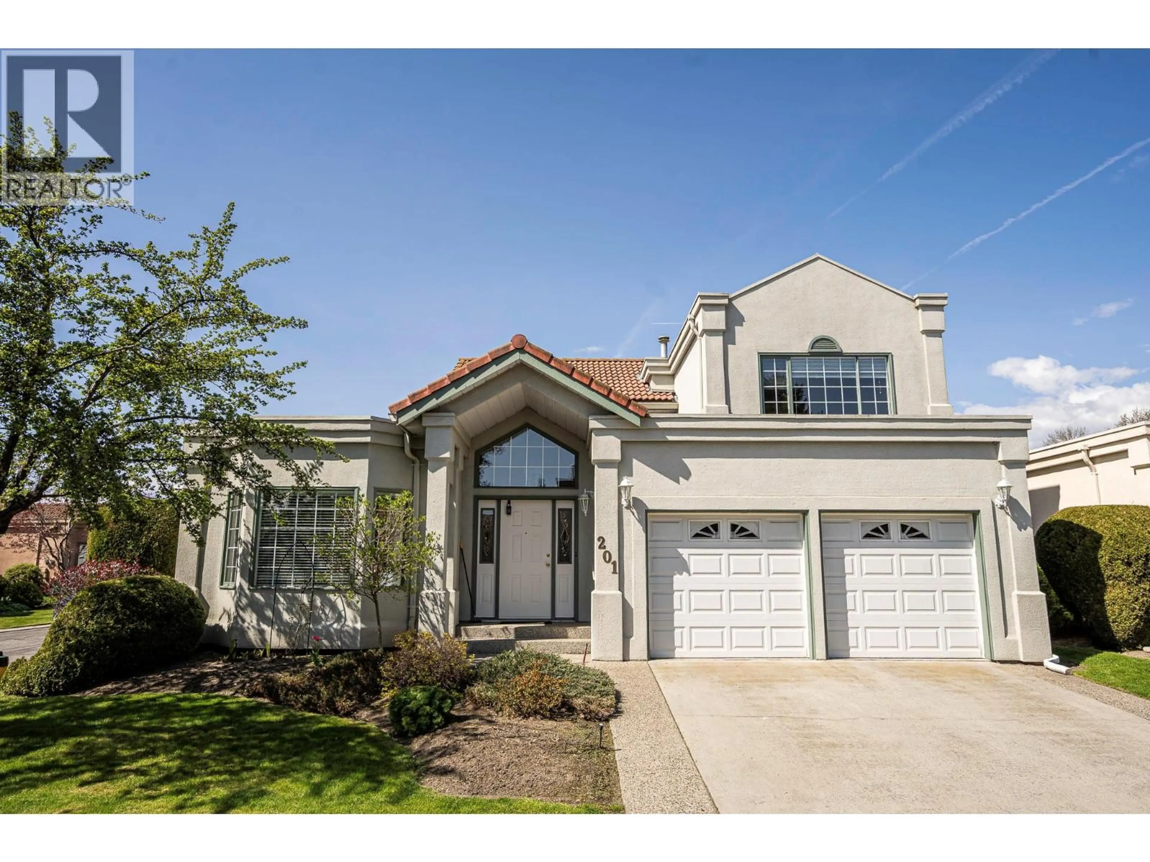 Home with vinyl exterior material, street for 201 - 650 LEXINGTON DRIVE, Kelowna British Columbia V1W3B6
