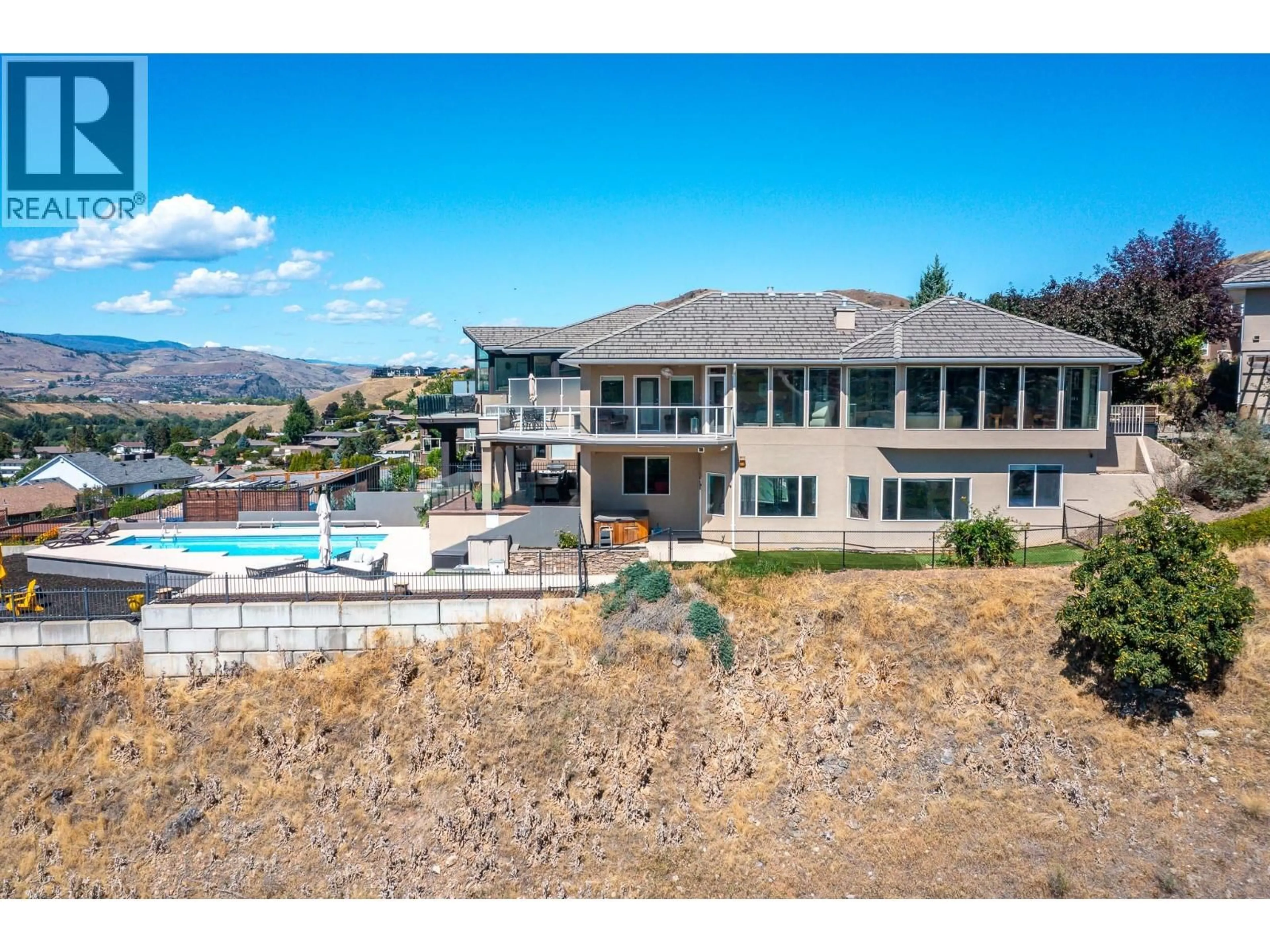 A pic from outside/outdoor area/front of a property/back of a property/a pic from drone, mountain view for 11 BAYVIEW HEIGHTS, Coldstream British Columbia V1B2B9