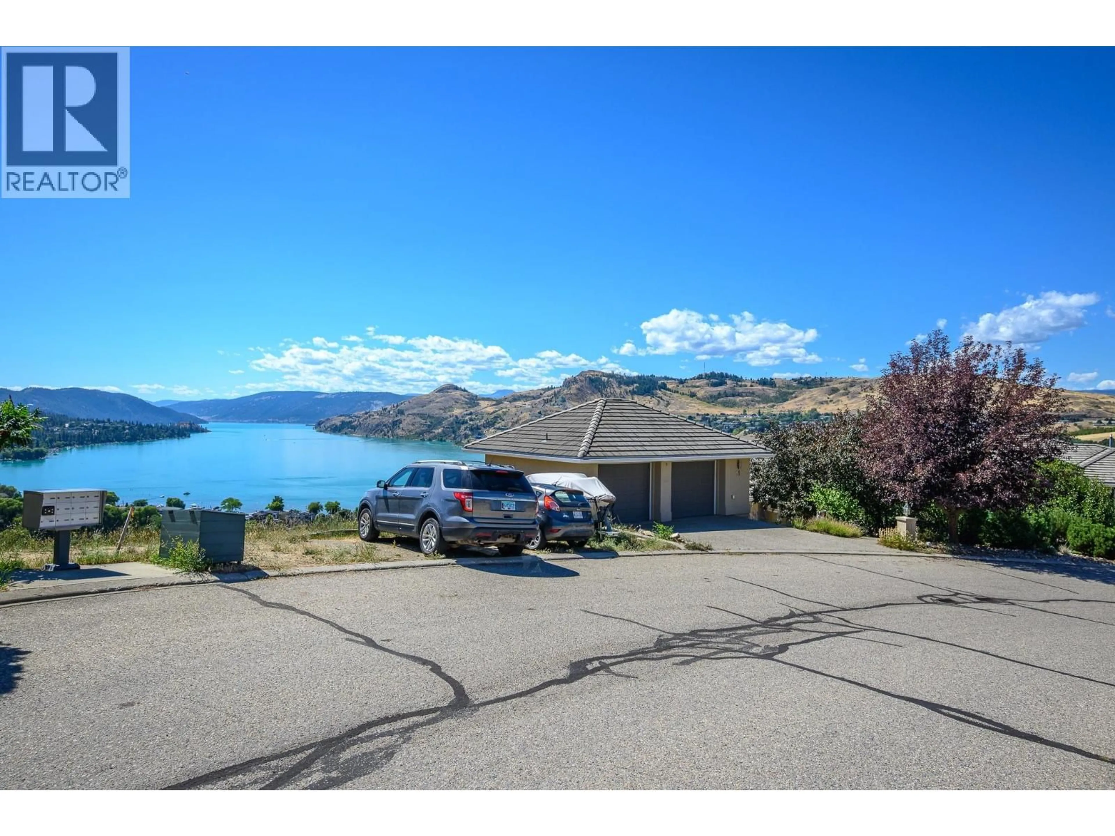 A pic from outside/outdoor area/front of a property/back of a property/a pic from drone, water/lake/river/ocean view for 11 BAYVIEW HEIGHTS, Coldstream British Columbia V1B2B9