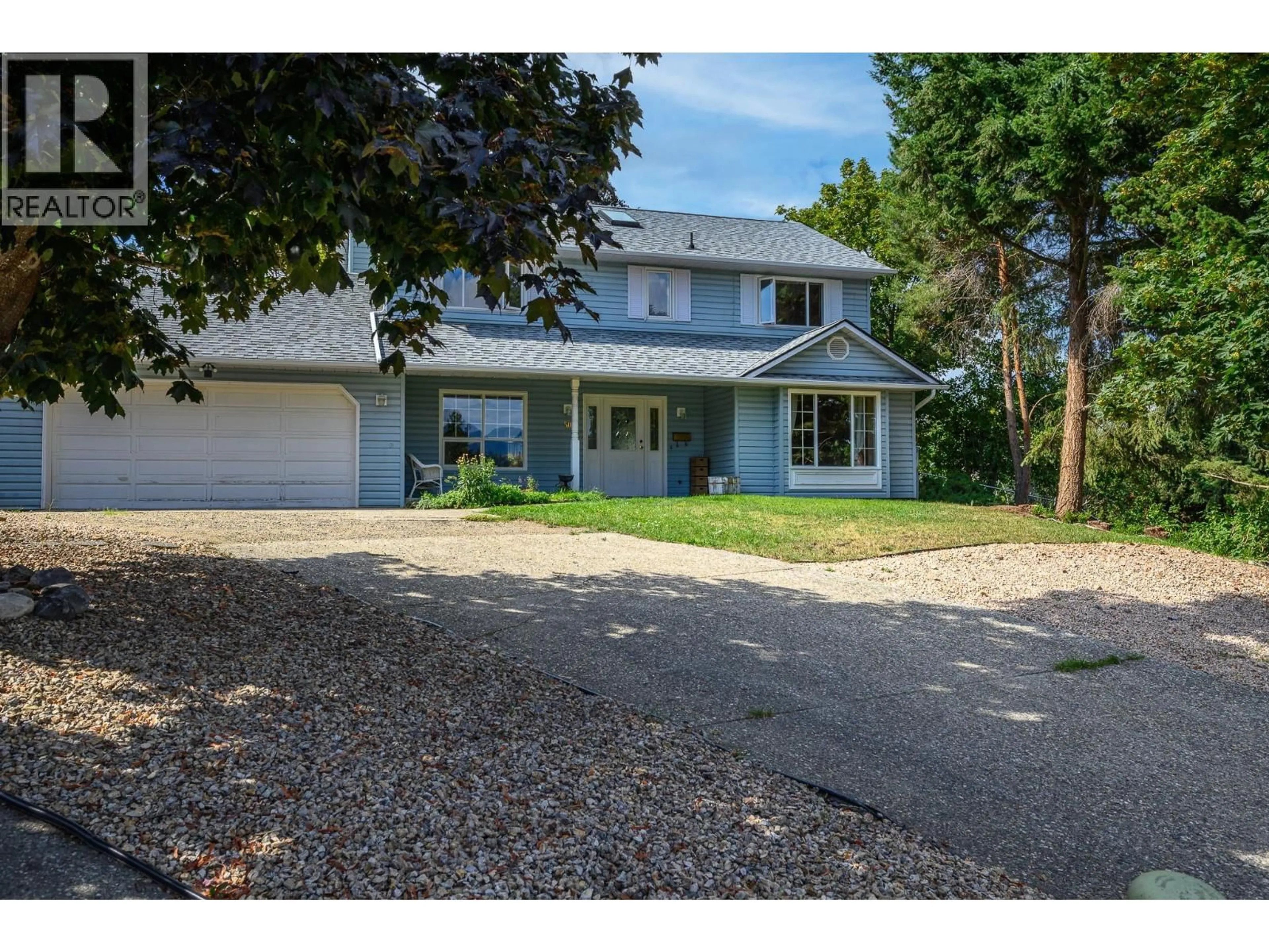 A pic from outside/outdoor area/front of a property/back of a property/a pic from drone, street for 50 LOCHHAVEN COURT, Coldstream British Columbia V1B2G9