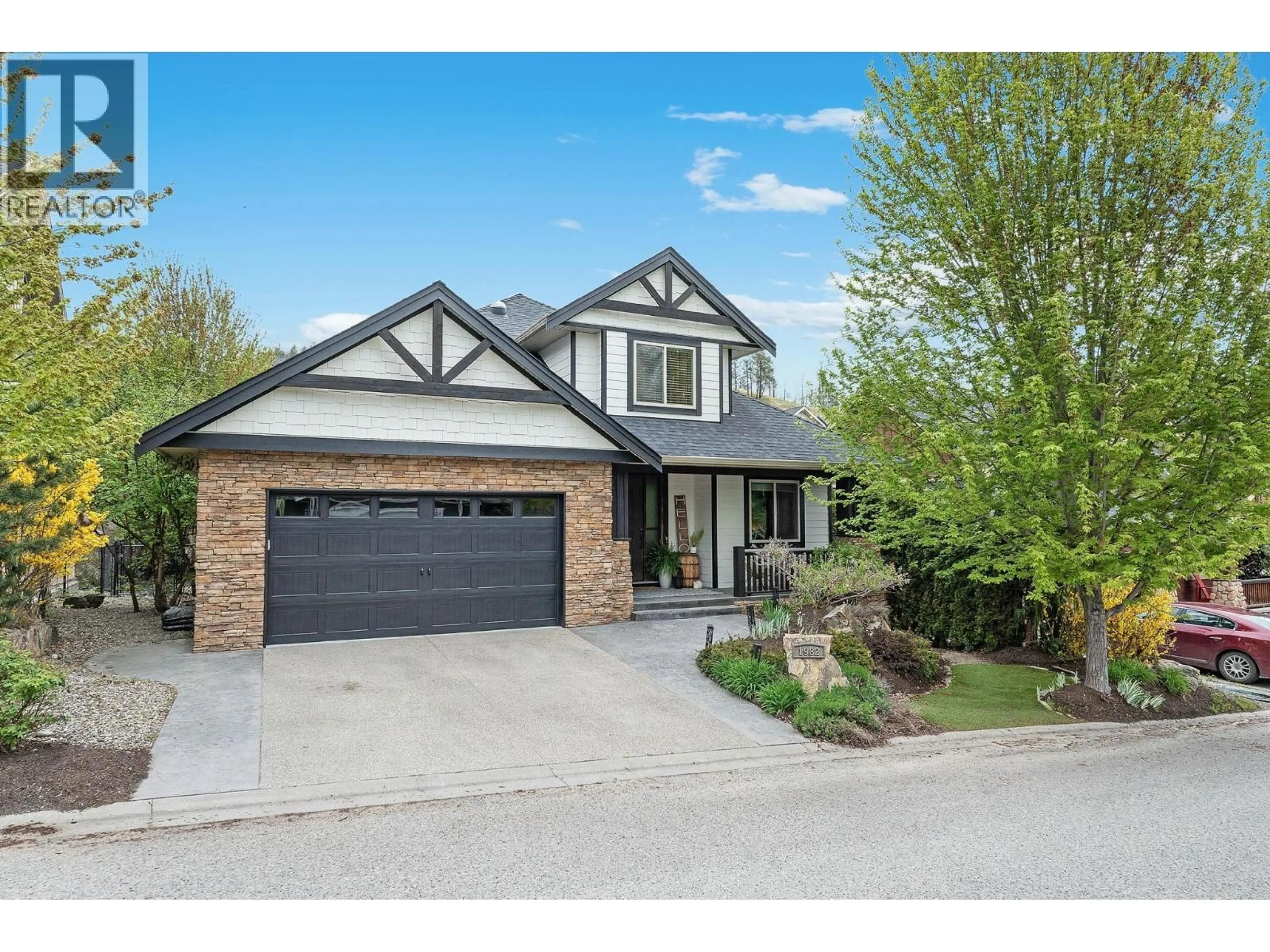 Home with brick exterior material, street for 1982 HIDDEN RIDGE PLACE, Kelowna British Columbia V1V2X8
