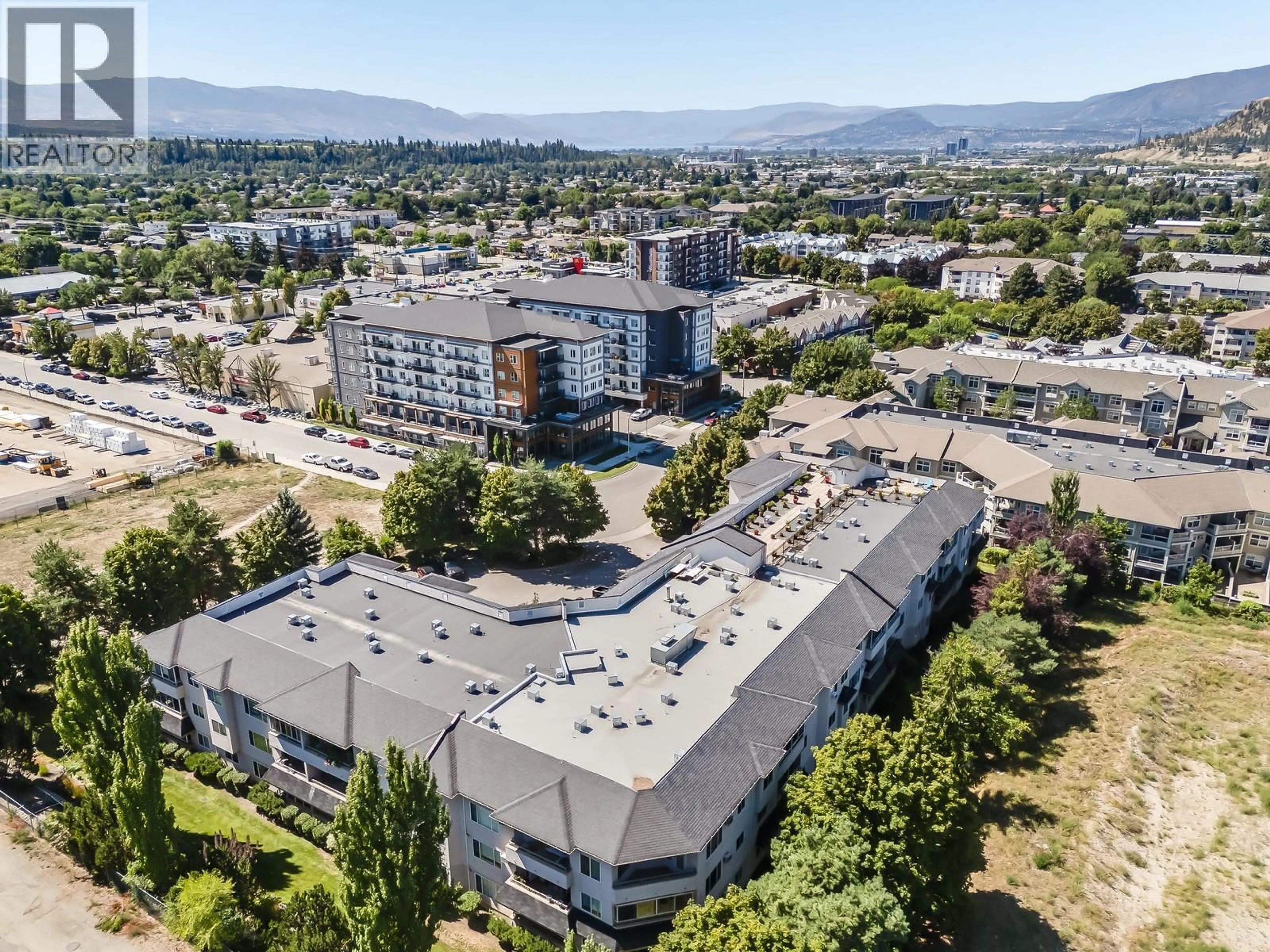 A pic from outside/outdoor area/front of a property/back of a property/a pic from drone, mountain view for 218 - 255 AURORA CRESCENT, Kelowna British Columbia V1X7L8