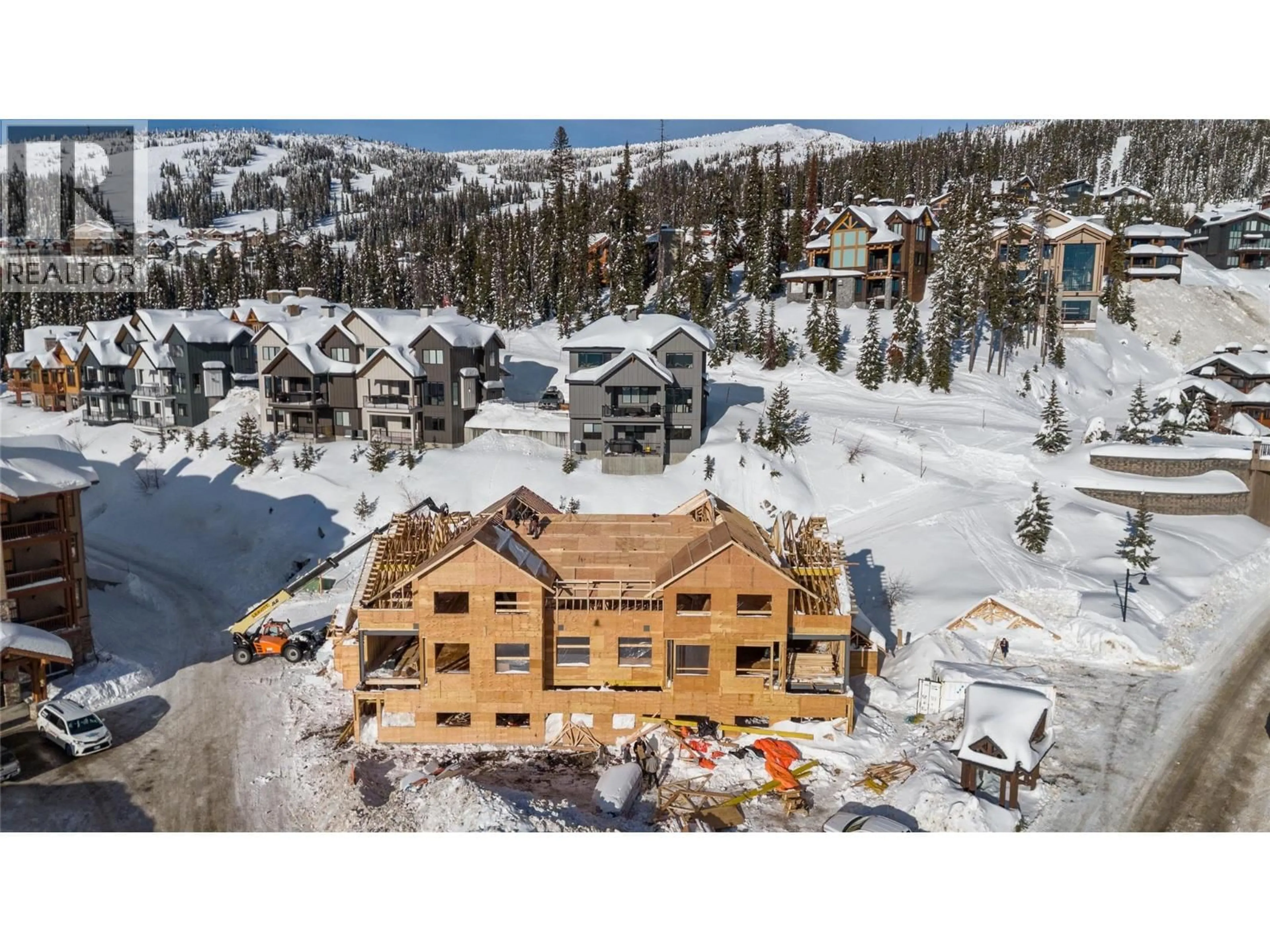 A pic from outside/outdoor area/front of a property/back of a property/a pic from drone, water/lake/river/ocean view for 86 - 255 FEATHERTOP WAY, Big White British Columbia V1P1P3