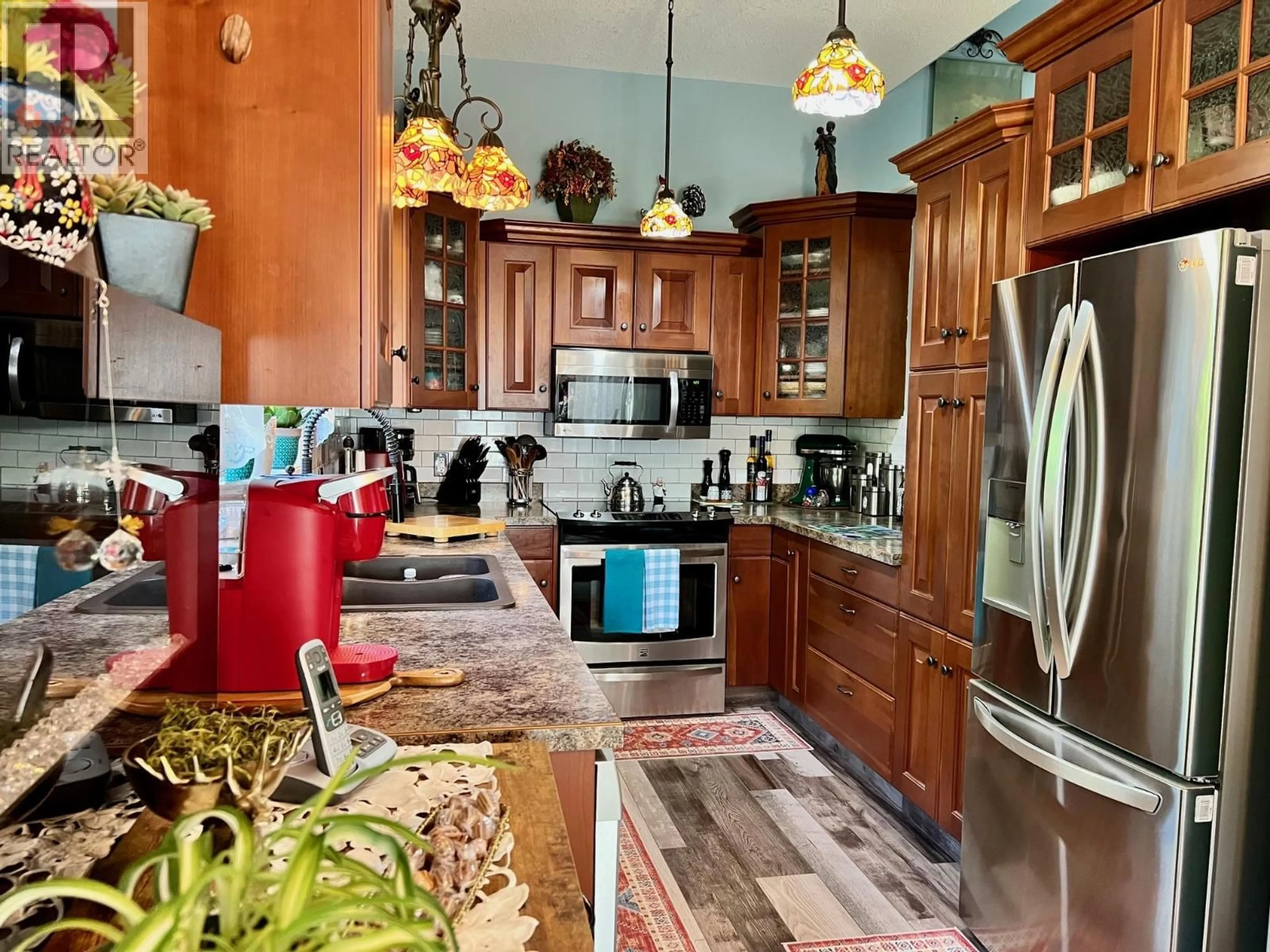Open concept kitchen, ceramic/tile floor for 515F 20TH AVENUE SOUTH, Creston British Columbia V0B1G1