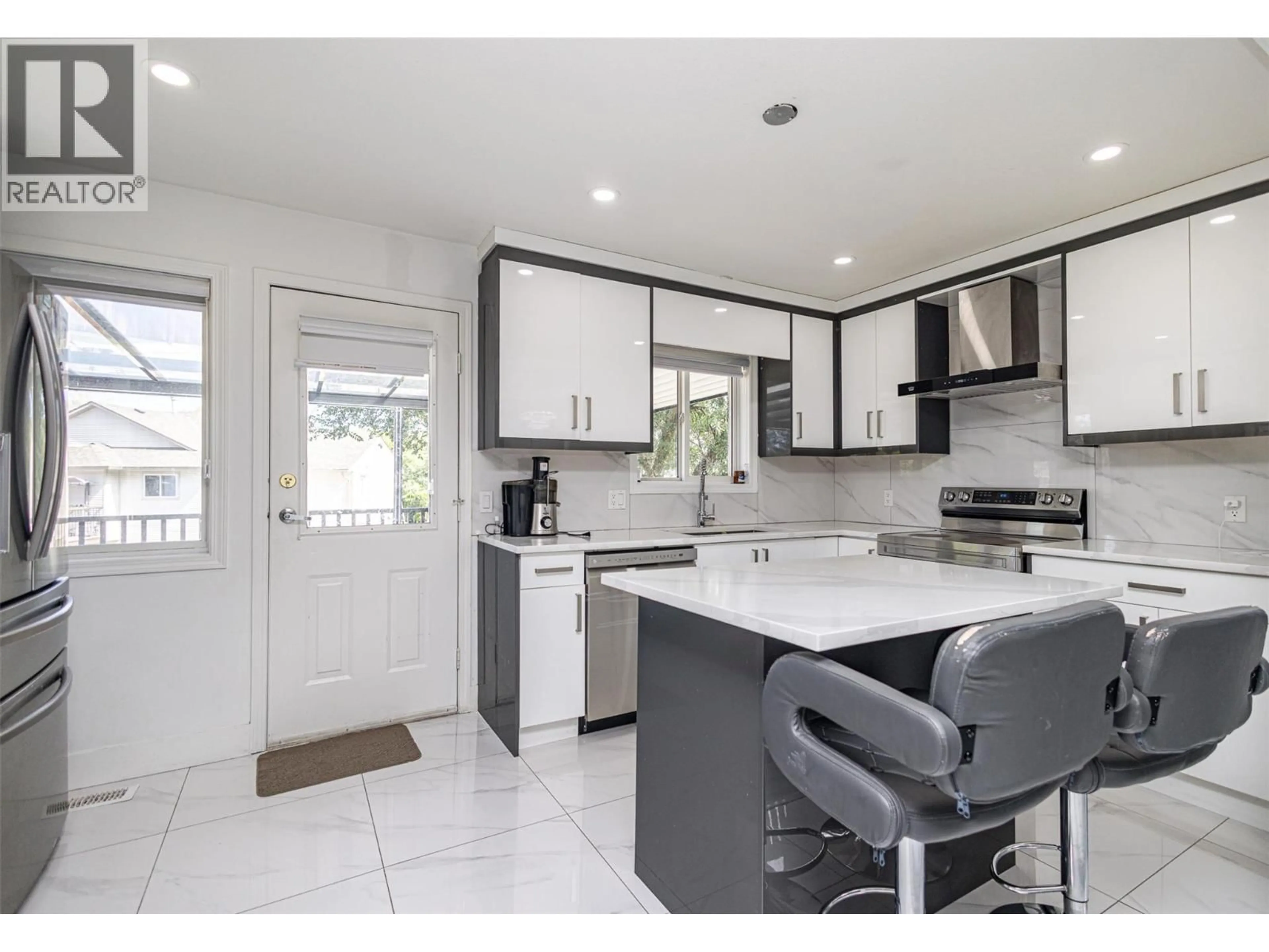 Open concept kitchen, ceramic/tile floor for 470 WALLACE ROAD, Kelowna British Columbia V1X4T4