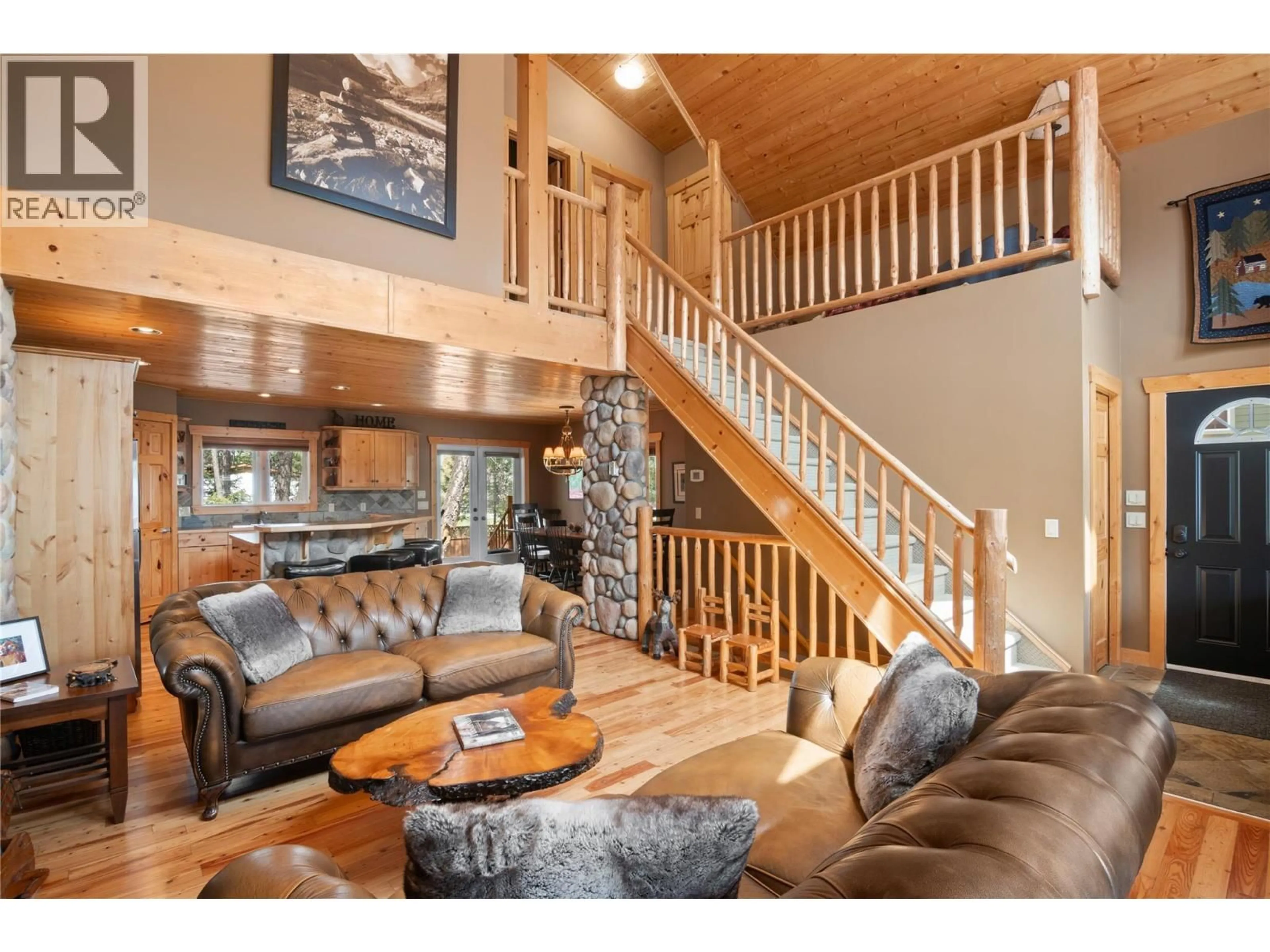 Living room with furniture, wood/laminate floor for 12 - 4868 RIVERVIEW DRIVE, Edgewater British Columbia V0A1E0
