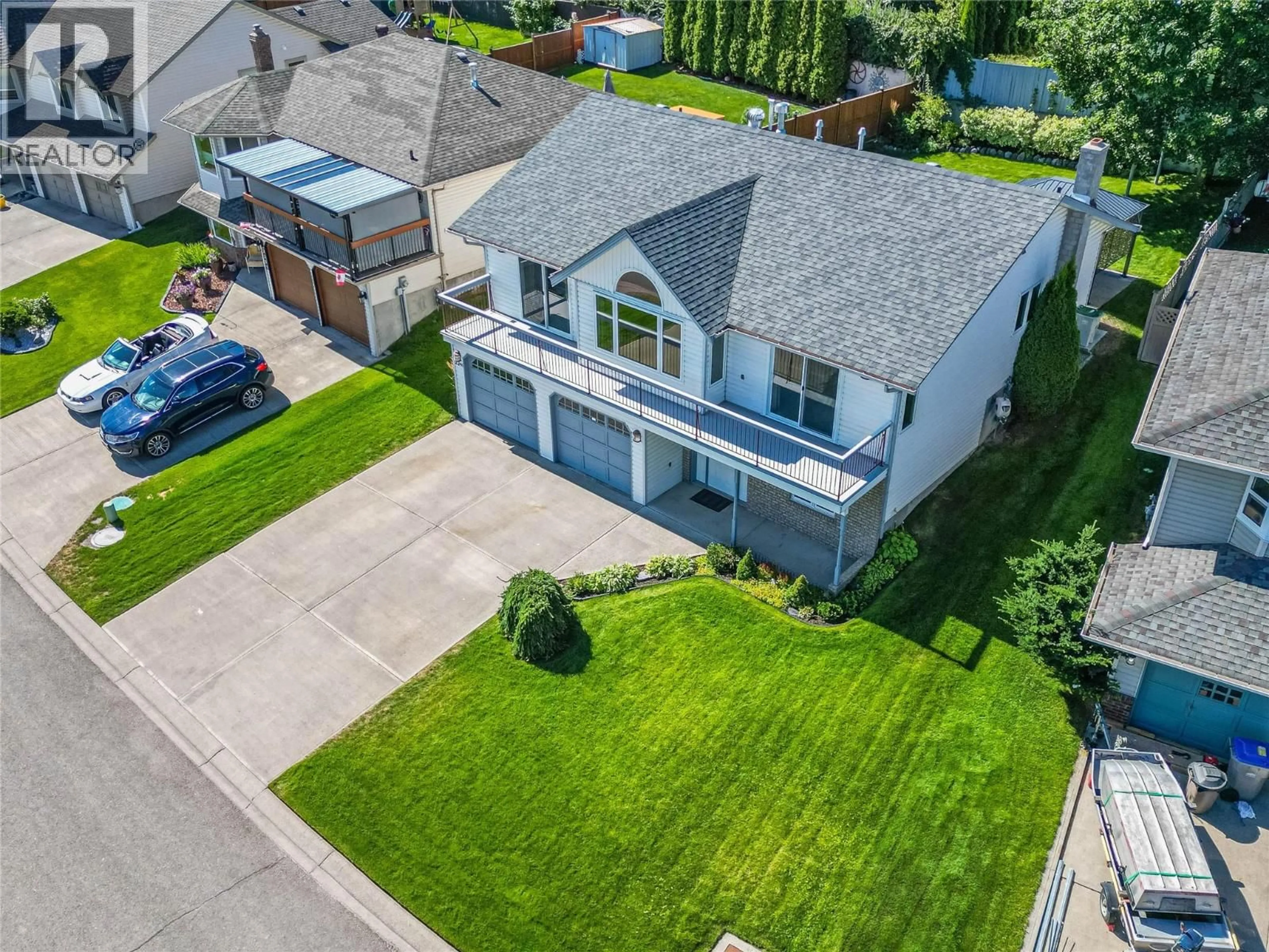 A pic from outside/outdoor area/front of a property/back of a property/a pic from drone, street for 2241 GARYMEDE DRIVE, Kamloops British Columbia V1S1P2