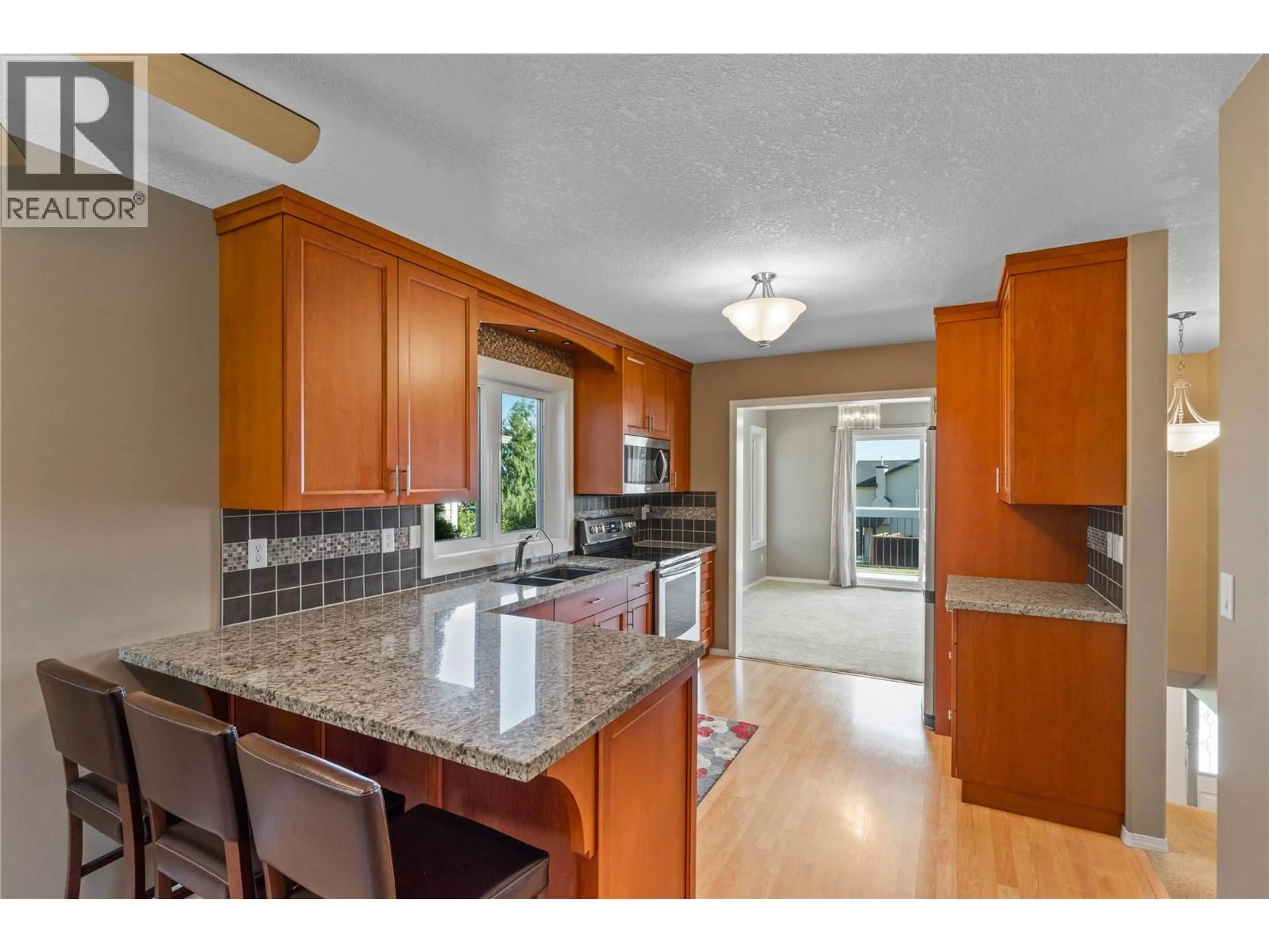 Open concept kitchen, ceramic/tile floor for 2241 GARYMEDE DRIVE, Kamloops British Columbia V1S1P2