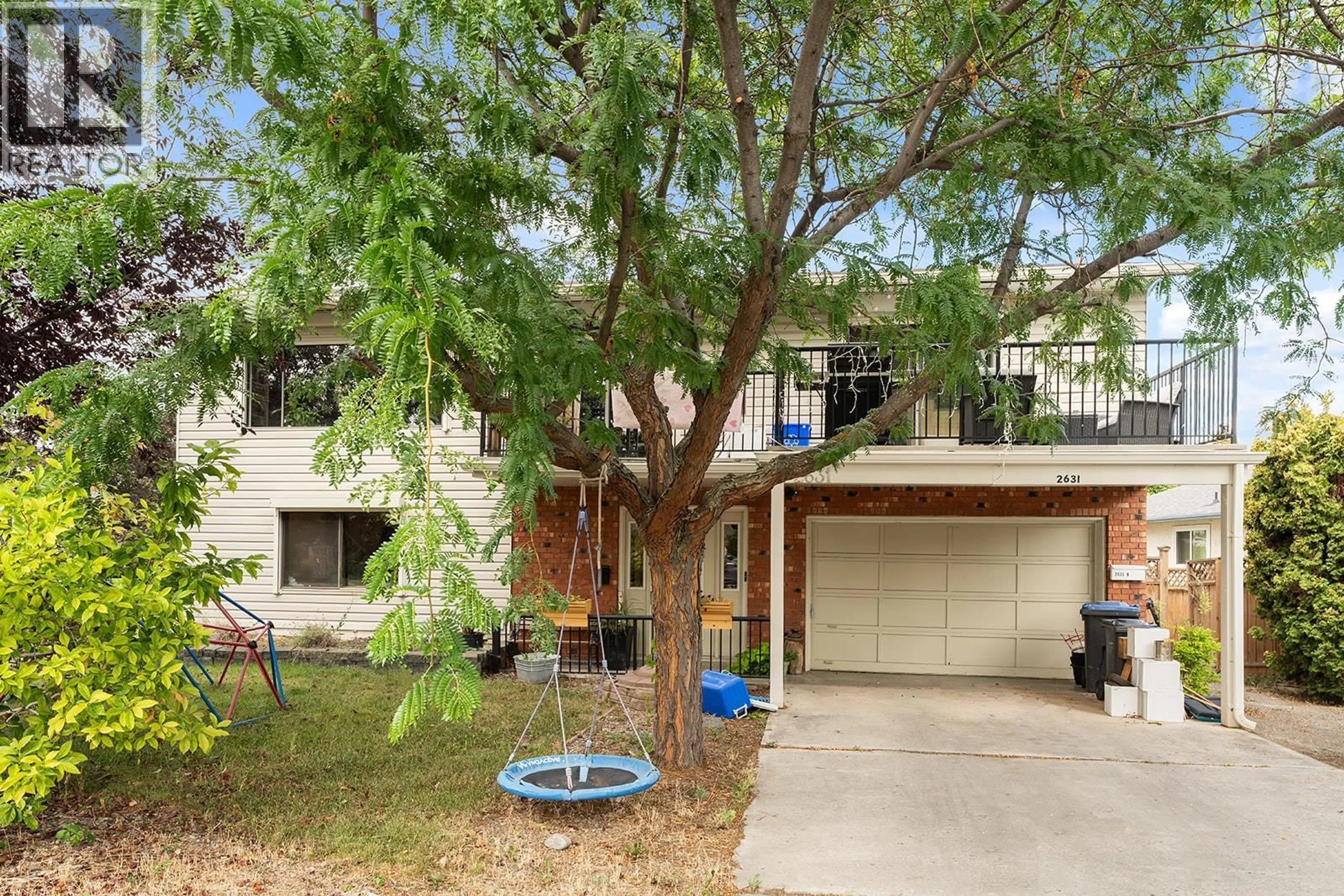 A pic from outside/outdoor area/front of a property/back of a property/a pic from drone, street for 2631 MAPPIN COURT, Kelowna British Columbia V1Y8H8