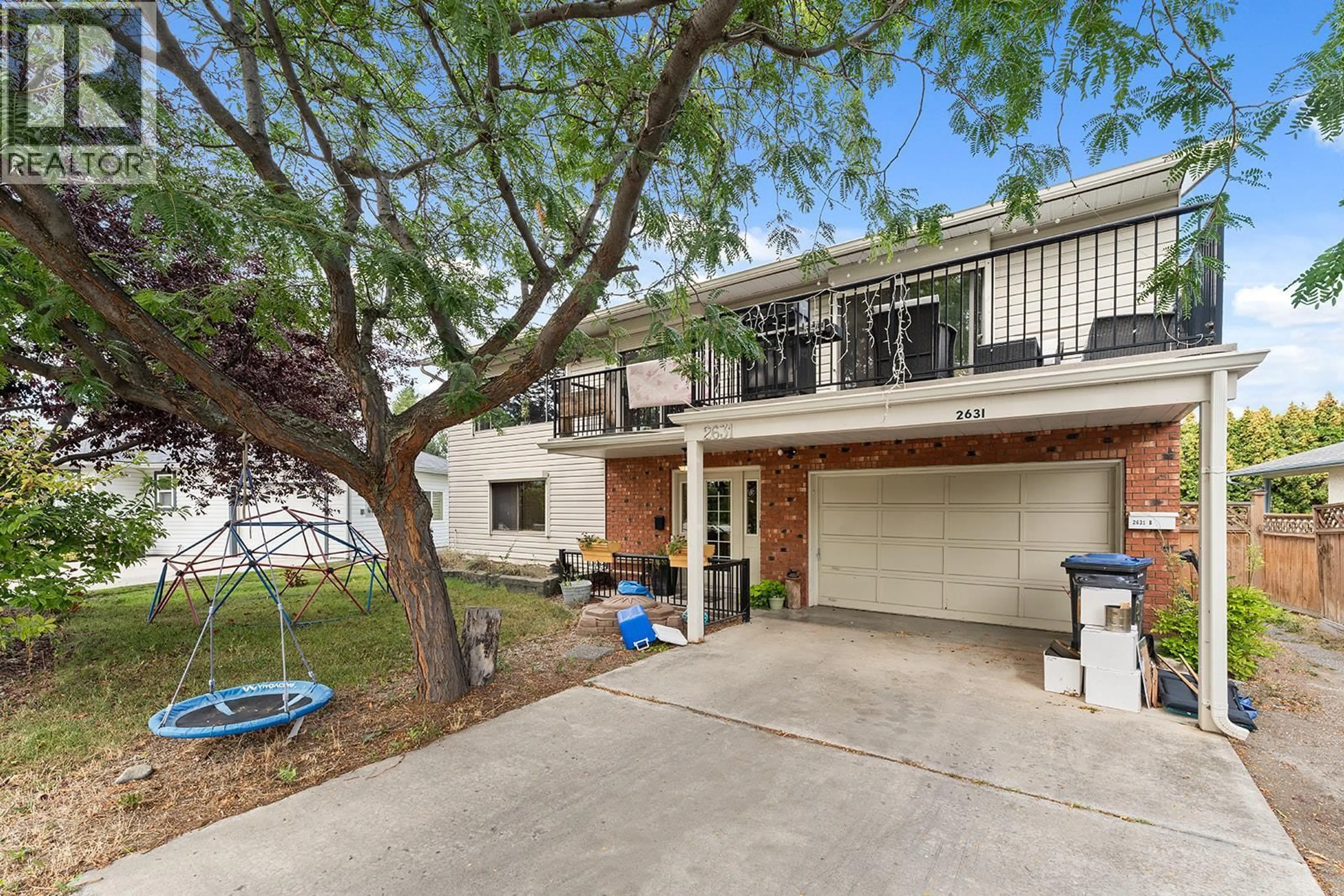 A pic from outside/outdoor area/front of a property/back of a property/a pic from drone, water/lake/river/ocean view for 2631 MAPPIN COURT, Kelowna British Columbia V1Y8H8