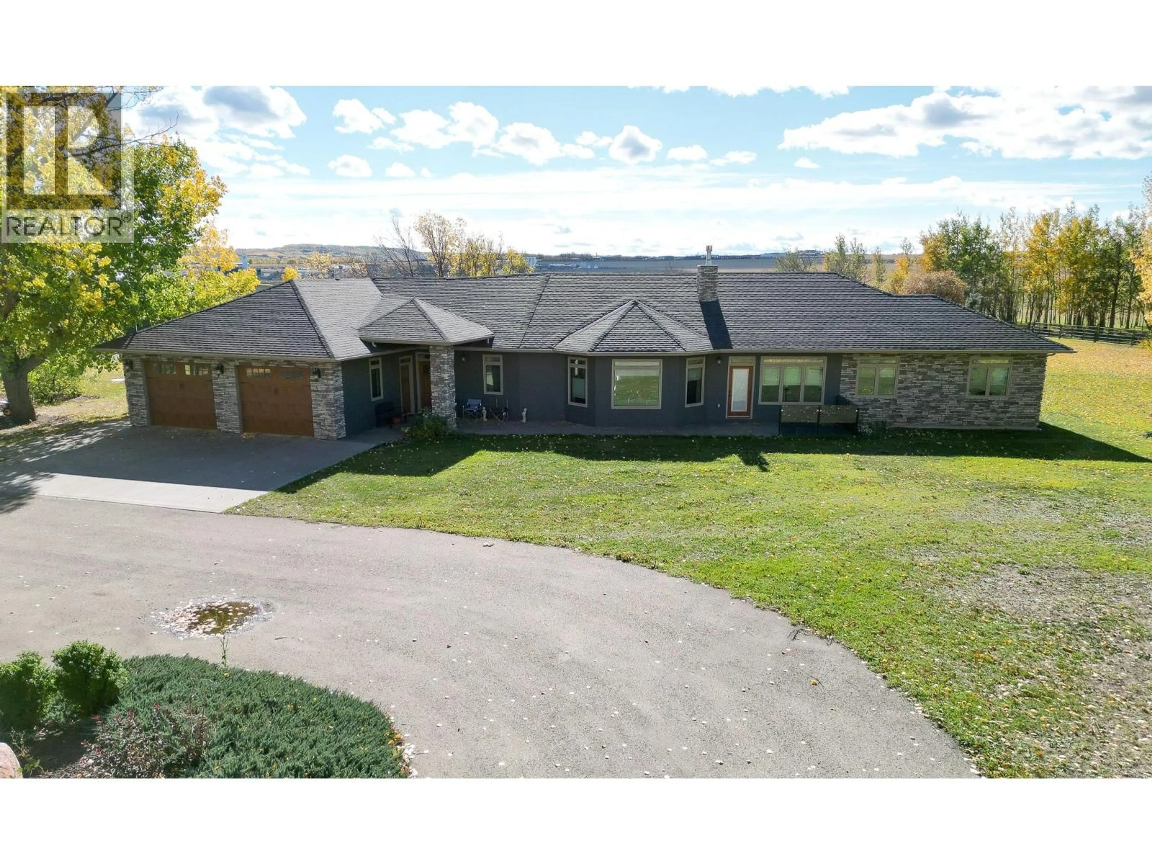 A pic from outside/outdoor area/front of a property/back of a property/a pic from drone, street for 2713 210 ROAD, Dawson Creek British Columbia V1G4H4