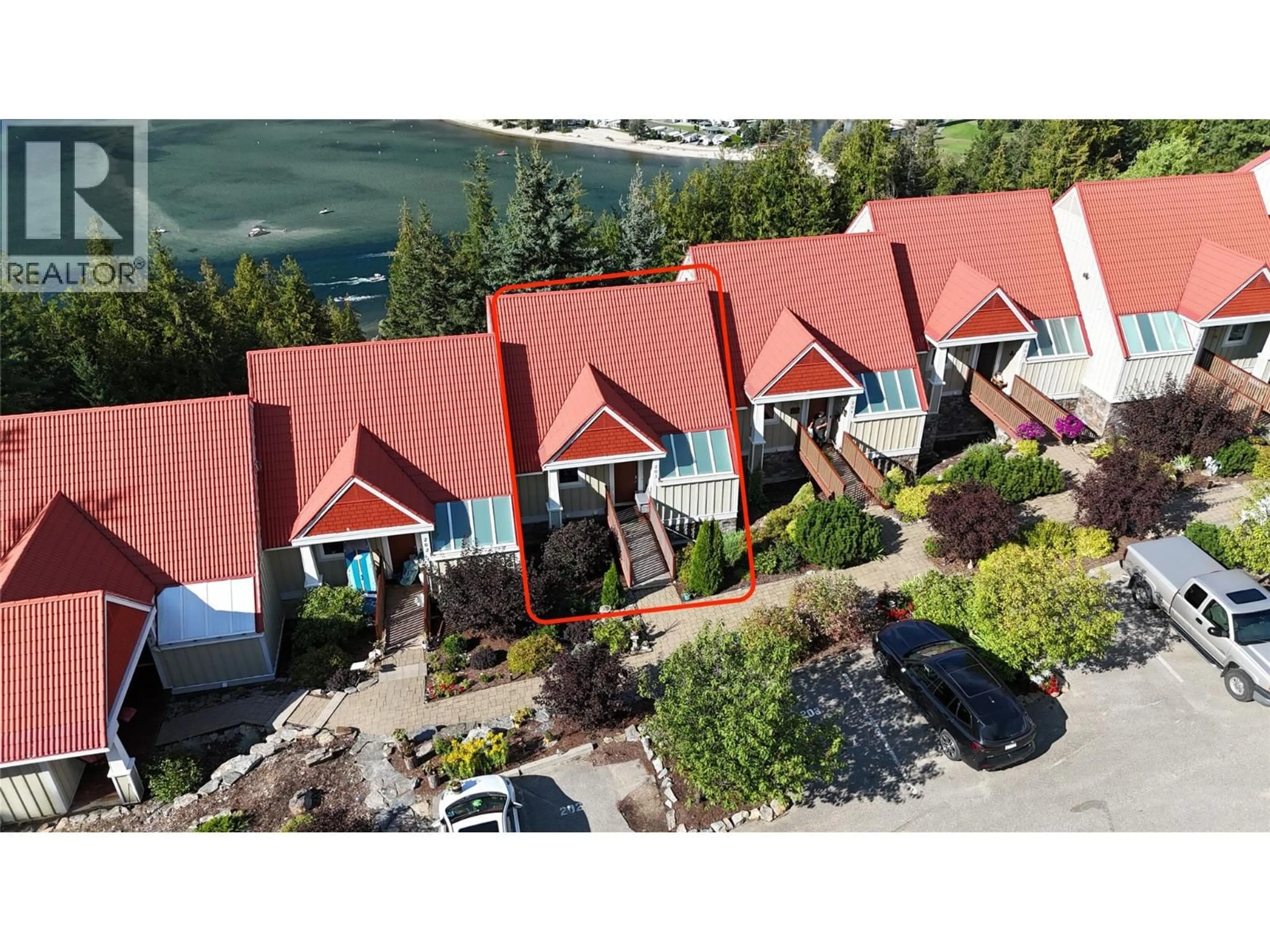 A pic from outside/outdoor area/front of a property/back of a property/a pic from drone, water/lake/river/ocean view for 203 - 500 OLD SPALLUMCHEEN ROAD, Sicamous British Columbia V0E2V3