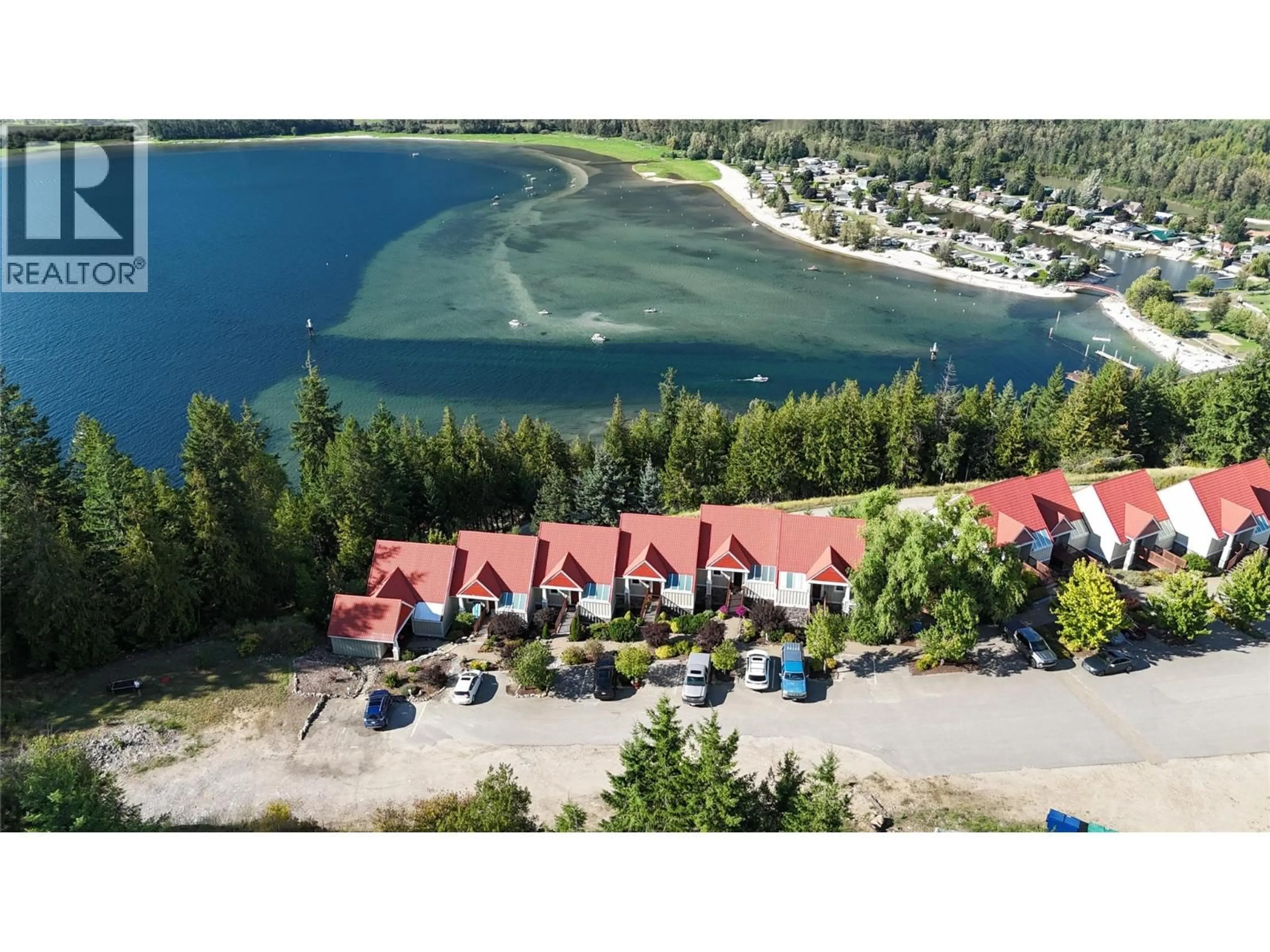 A pic from outside/outdoor area/front of a property/back of a property/a pic from drone, water/lake/river/ocean view for 203 - 500 OLD SPALLUMCHEEN ROAD, Sicamous British Columbia V0E2V3