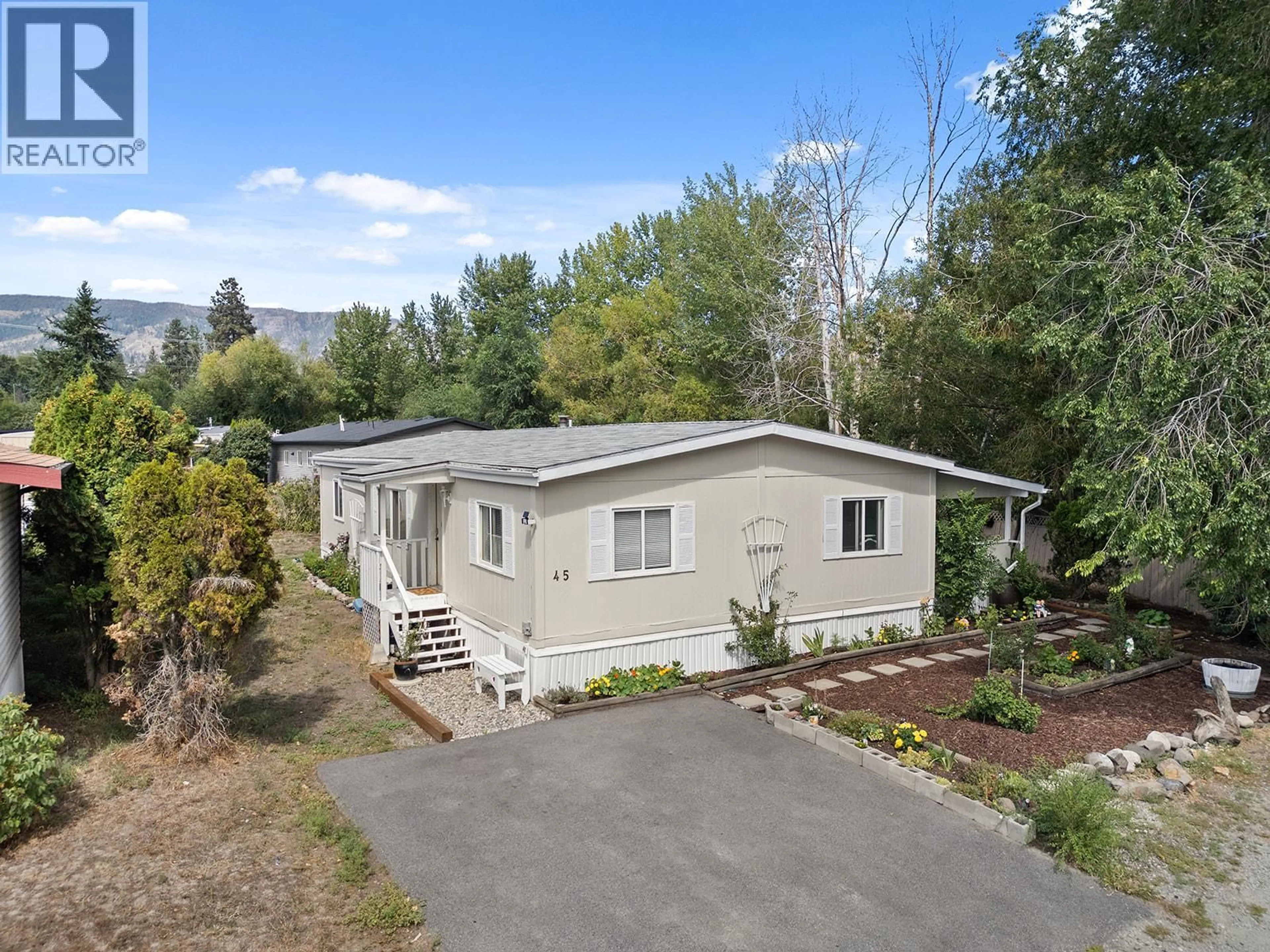A pic from outside/outdoor area/front of a property/back of a property/a pic from drone, mountain view for 45 - 1881 BOUCHERIE ROAD, Westbank British Columbia V4T0C9