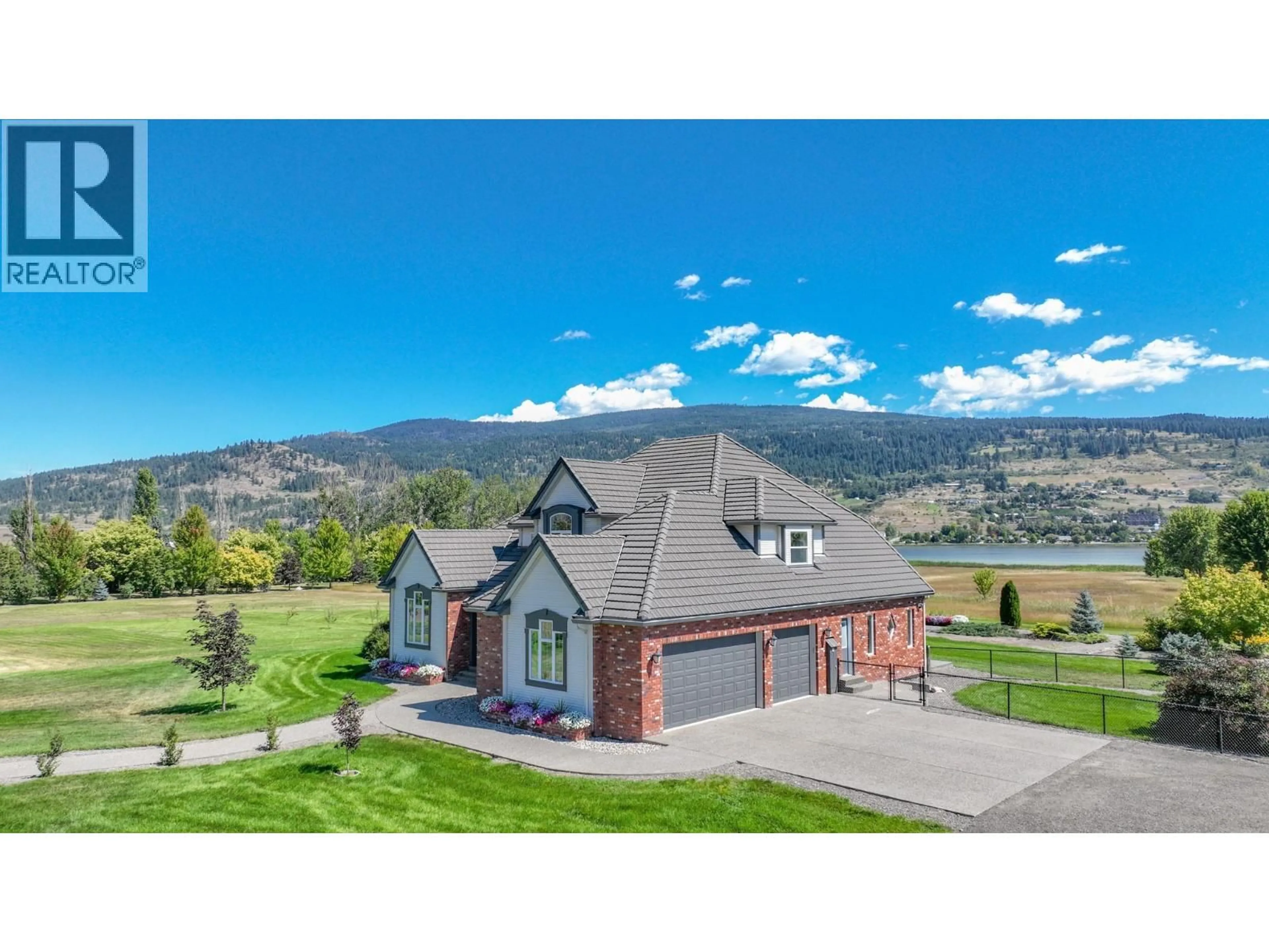 A pic from outside/outdoor area/front of a property/back of a property/a pic from drone, mountain view for 8163 OLD KAMLOOPS ROAD, Vernon British Columbia V1H1W8