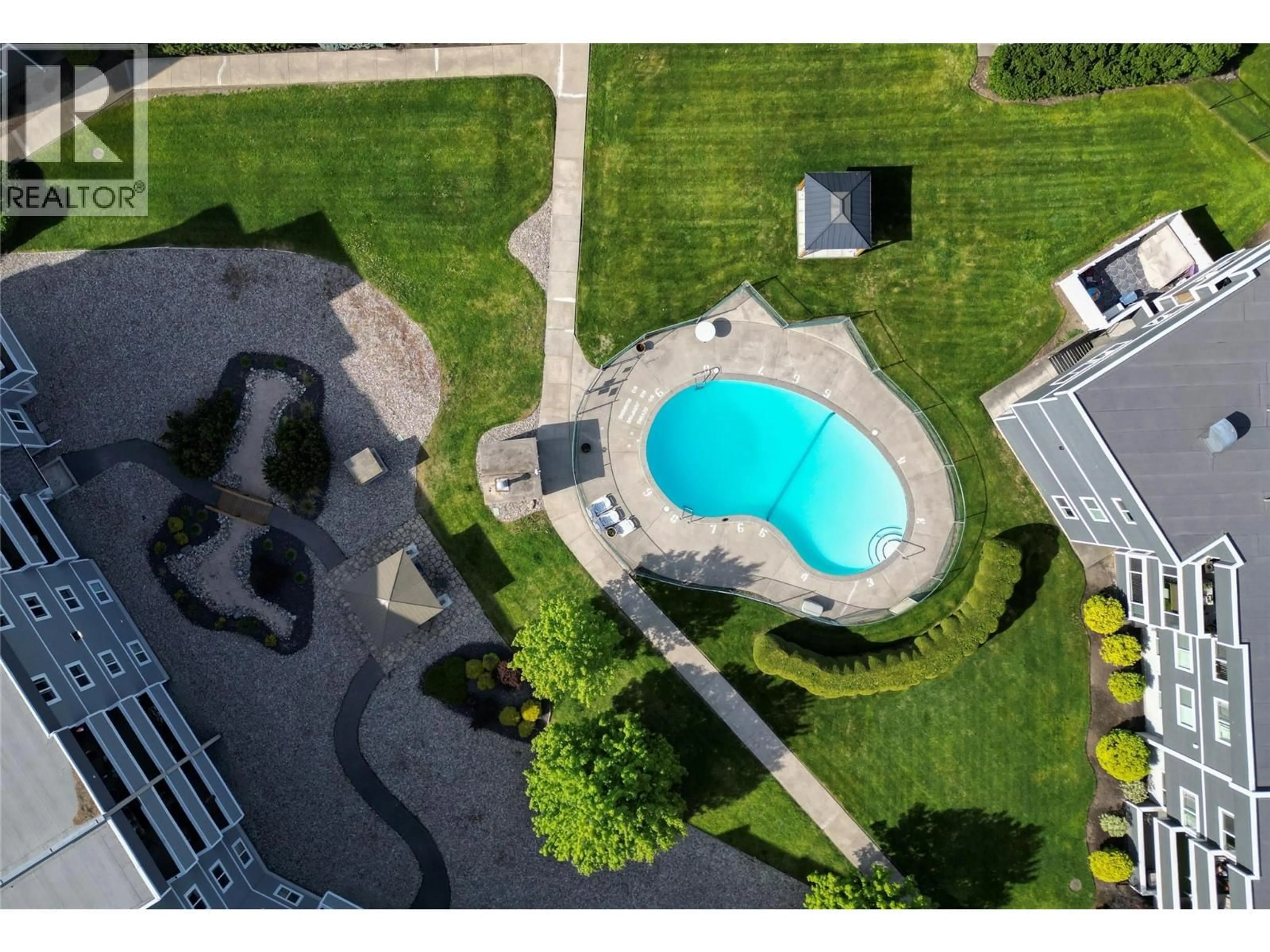 A pic from outside/outdoor area/front of a property/back of a property/a pic from drone, water/lake/river/ocean view for 238 - 495 ALL STAR COURT, Kelowna British Columbia V1X5N7