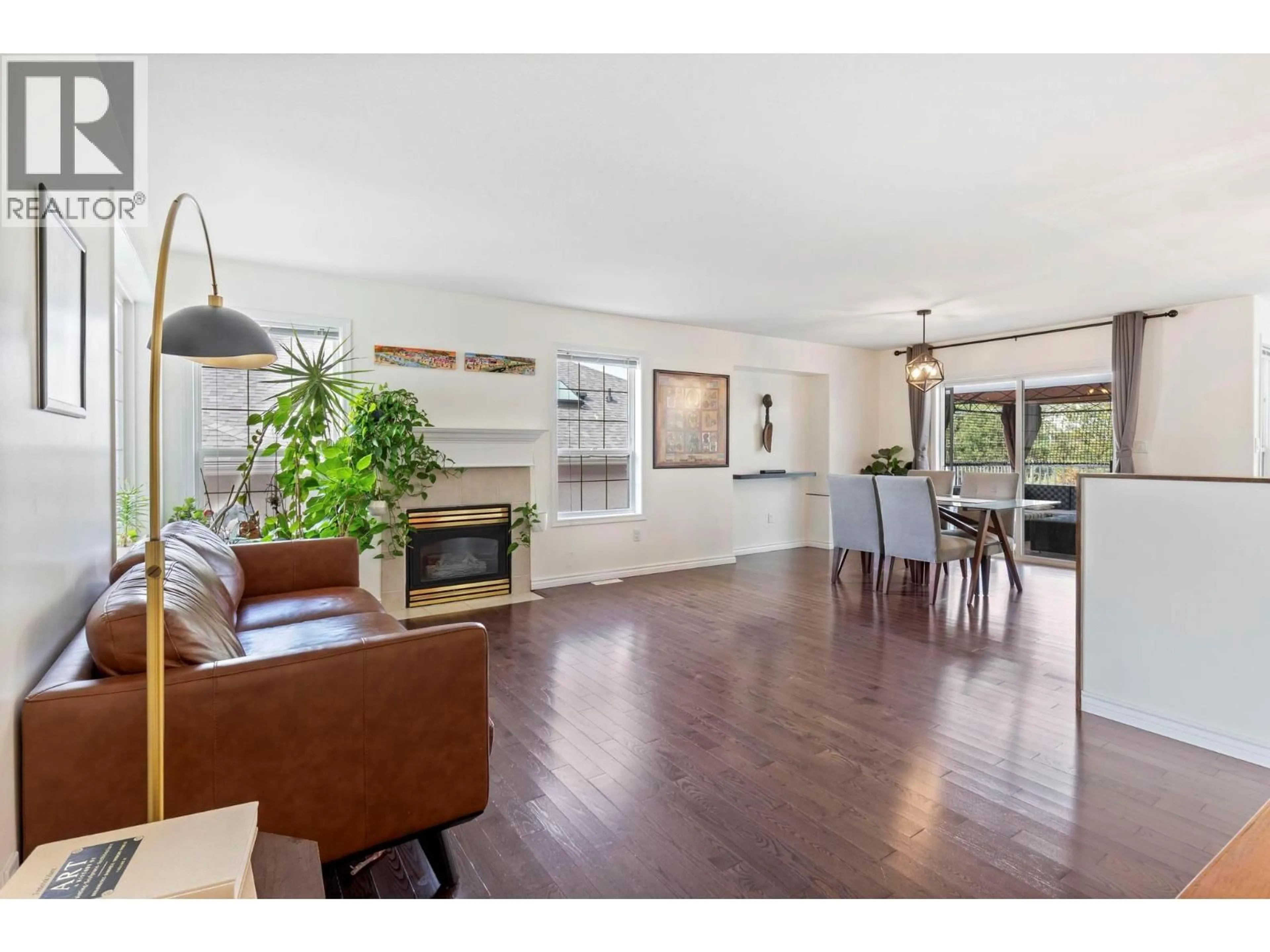 Living room with furniture, wood/laminate floor for 2098 SUNVIEW DRIVE, West Kelowna British Columbia V1Z3P9