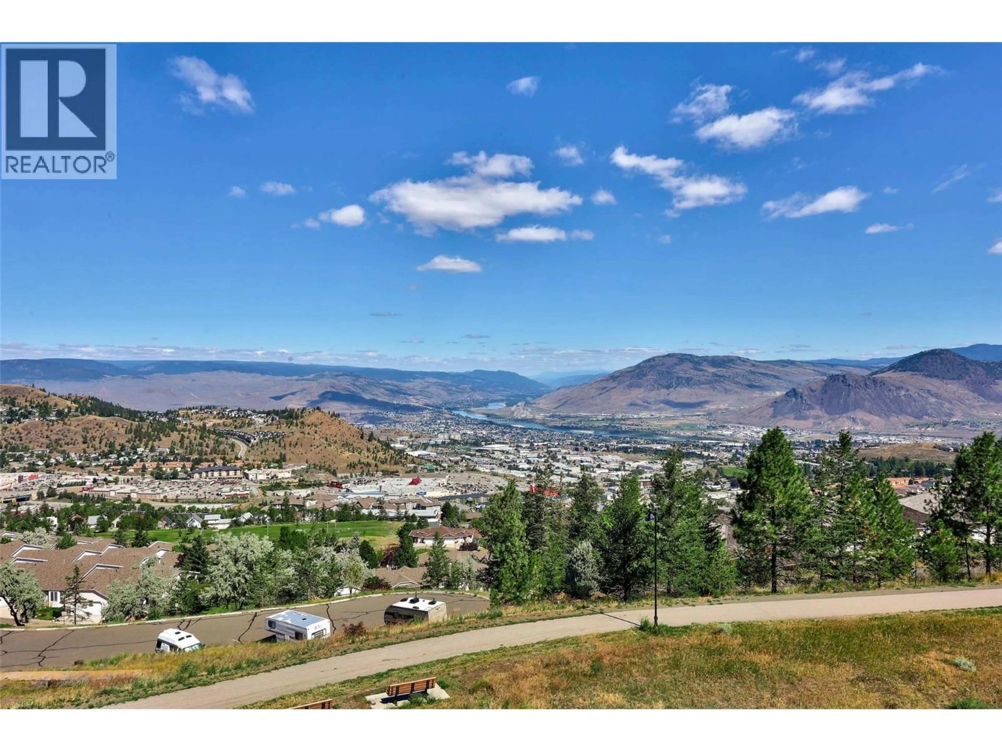 A pic from outside/outdoor area/front of a property/back of a property/a pic from drone, mountain view for 1182 ST ANDREWS WAY, Kamloops British Columbia V1S1S7