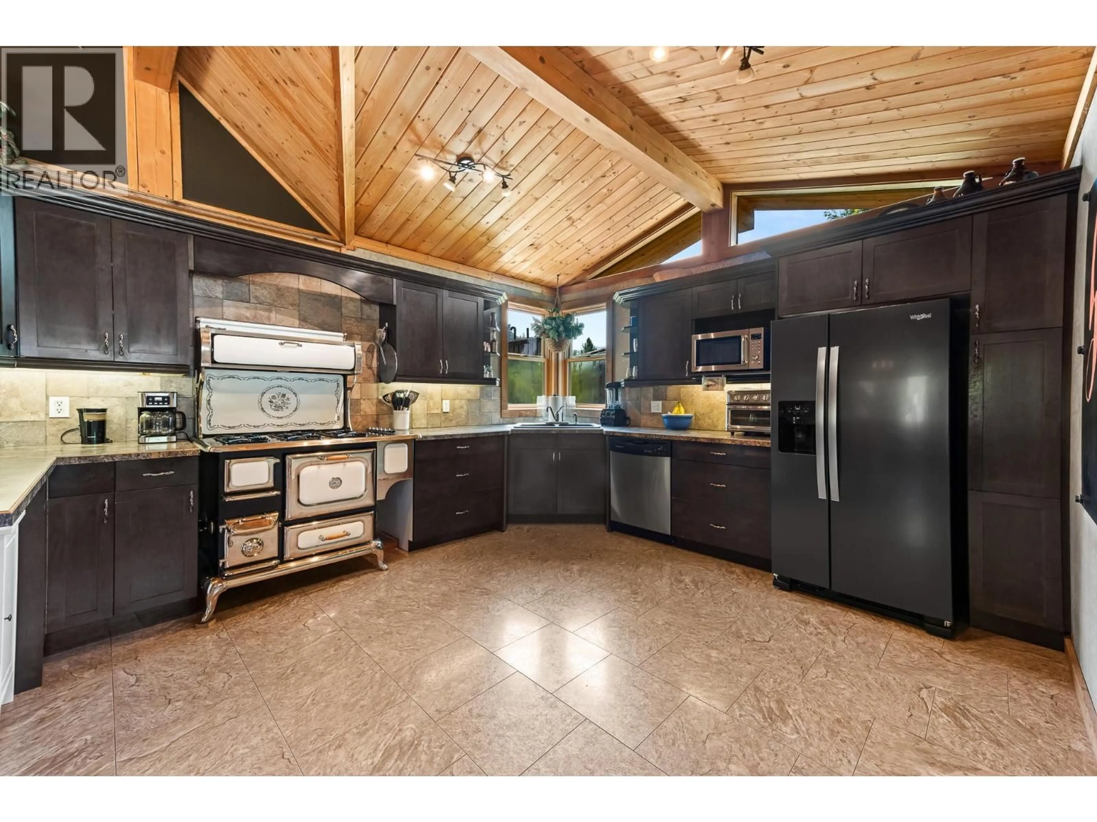 Open concept kitchen, ceramic/tile floor for 9250 KYRKE STREET, Elko British Columbia V0B1T3