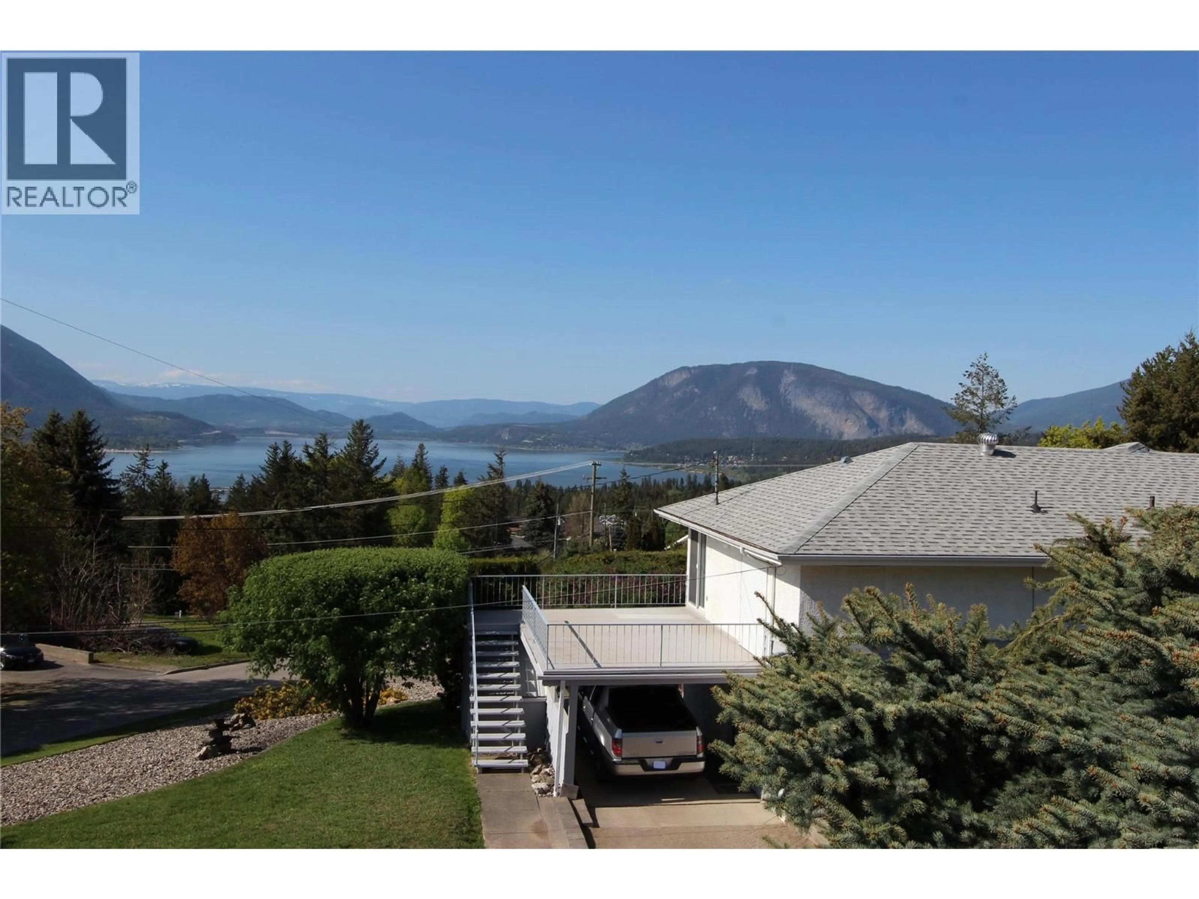 A pic from outside/outdoor area/front of a property/back of a property/a pic from drone, water/lake/river/ocean view for 1290 15 STREET SOUTHEAST, Salmon Arm British Columbia V1E2G8