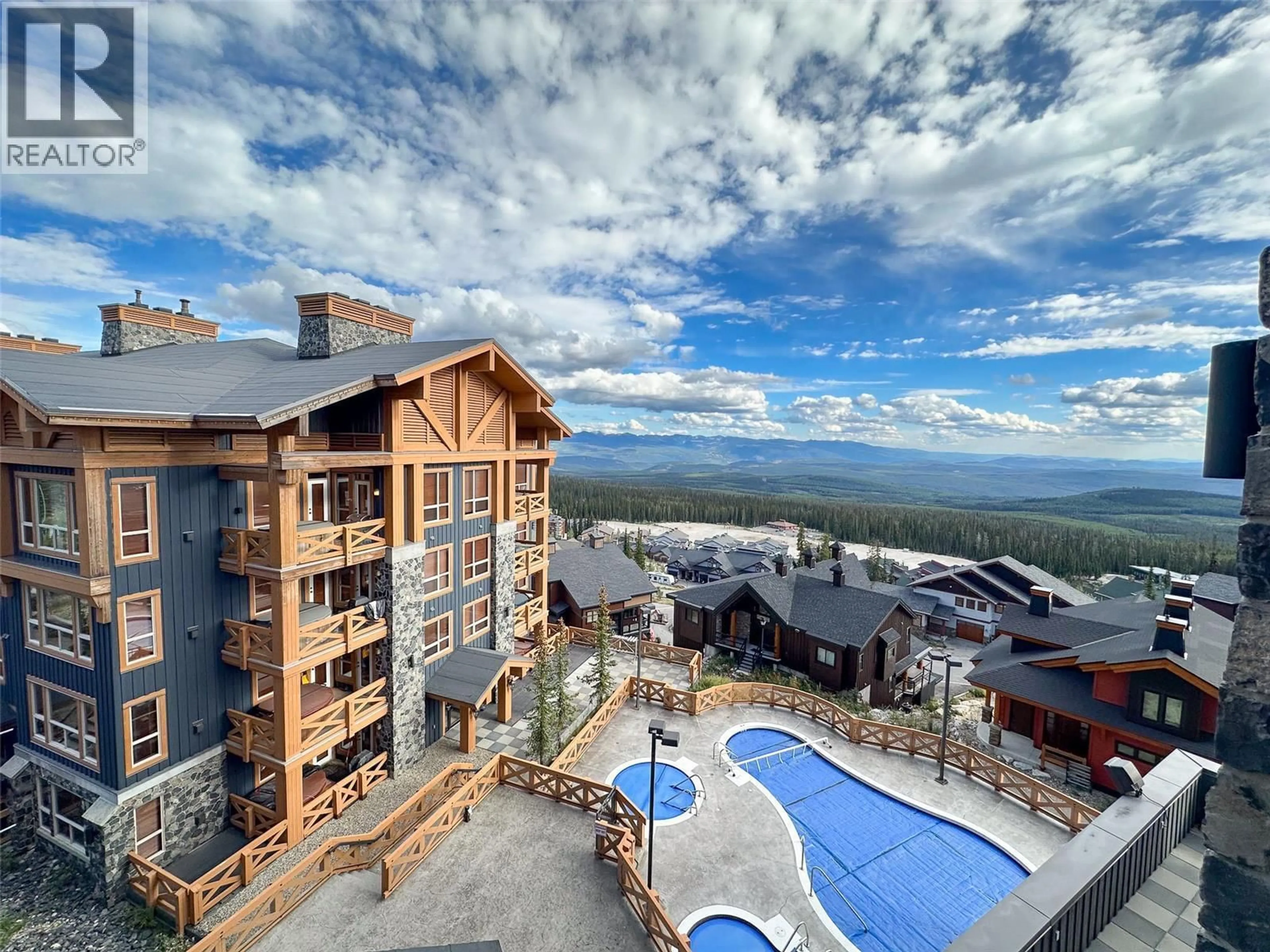 A pic from outside/outdoor area/front of a property/back of a property/a pic from drone, mountain view for 2208 - 375 RAVEN RIDGE ROAD, Big White British Columbia V1P1P3