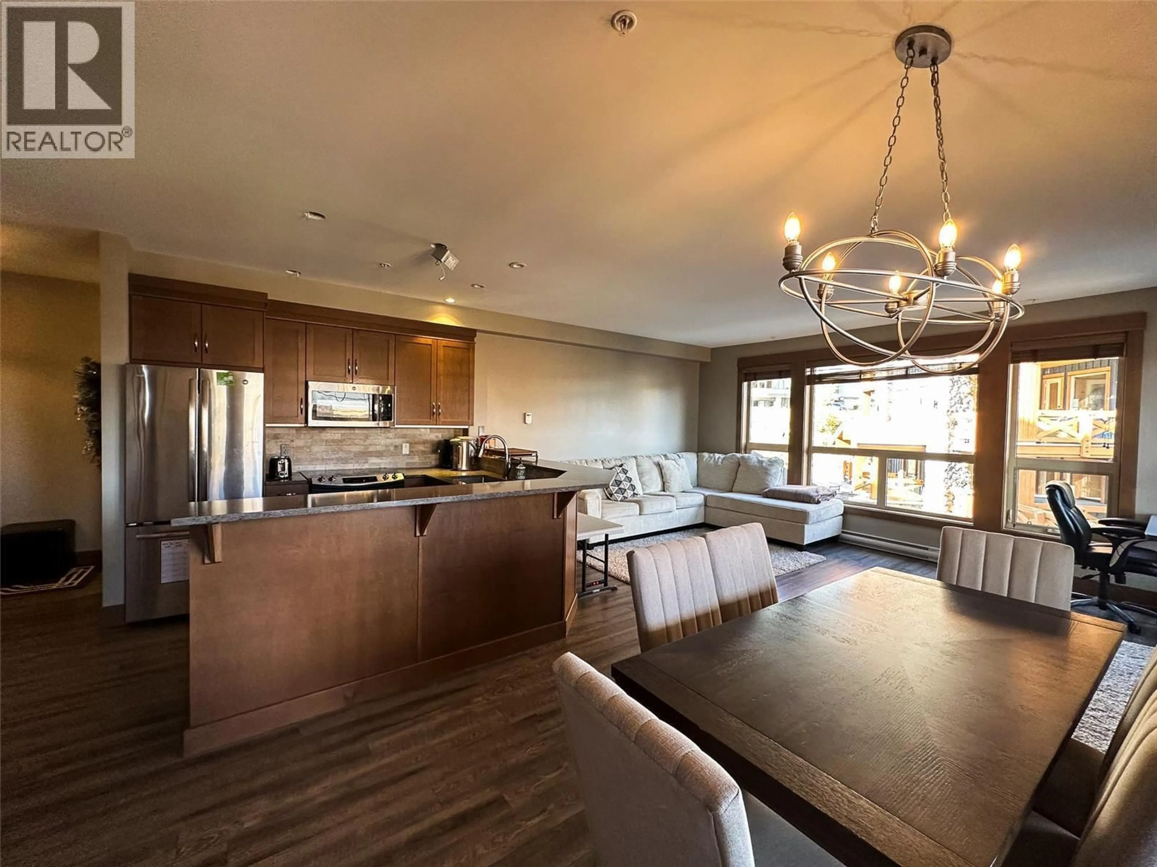 Open concept kitchen, wood/laminate floor for 2208 - 375 RAVEN RIDGE ROAD, Big White British Columbia V1P1T4