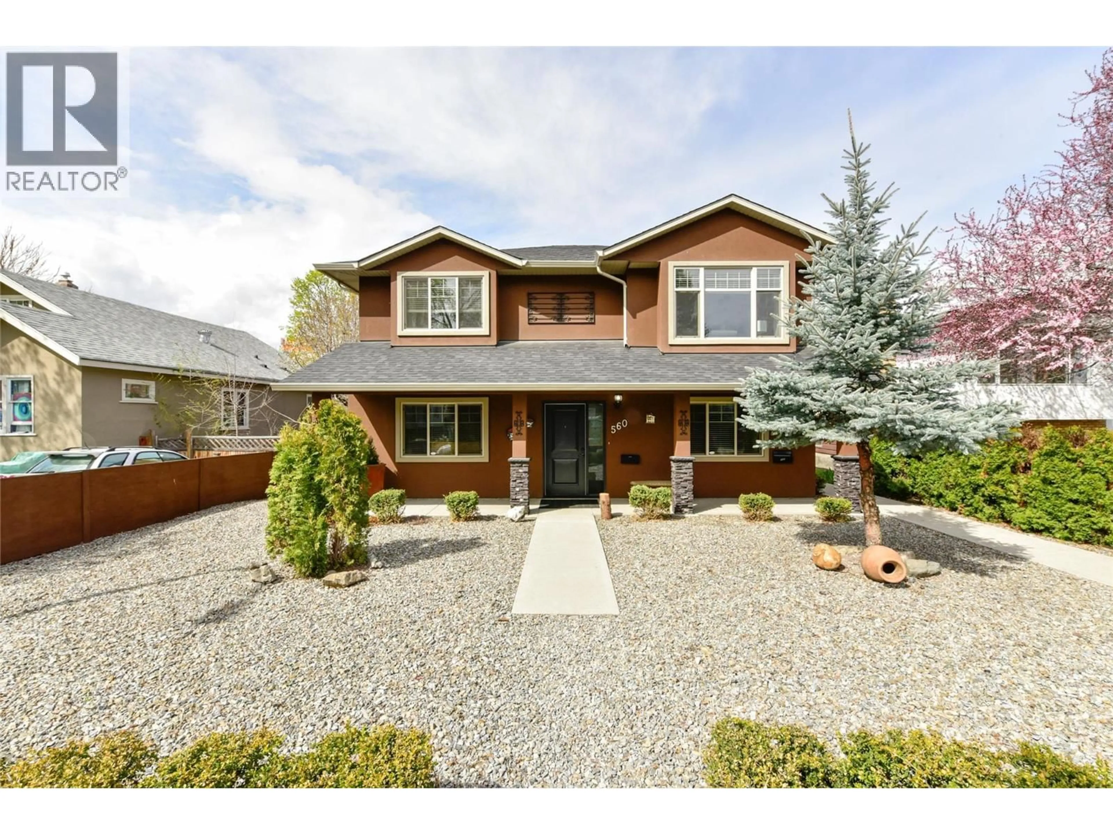 Home with brick exterior material, street for 560 CHRISTLETON AVENUE, Kelowna British Columbia V1Y5J2