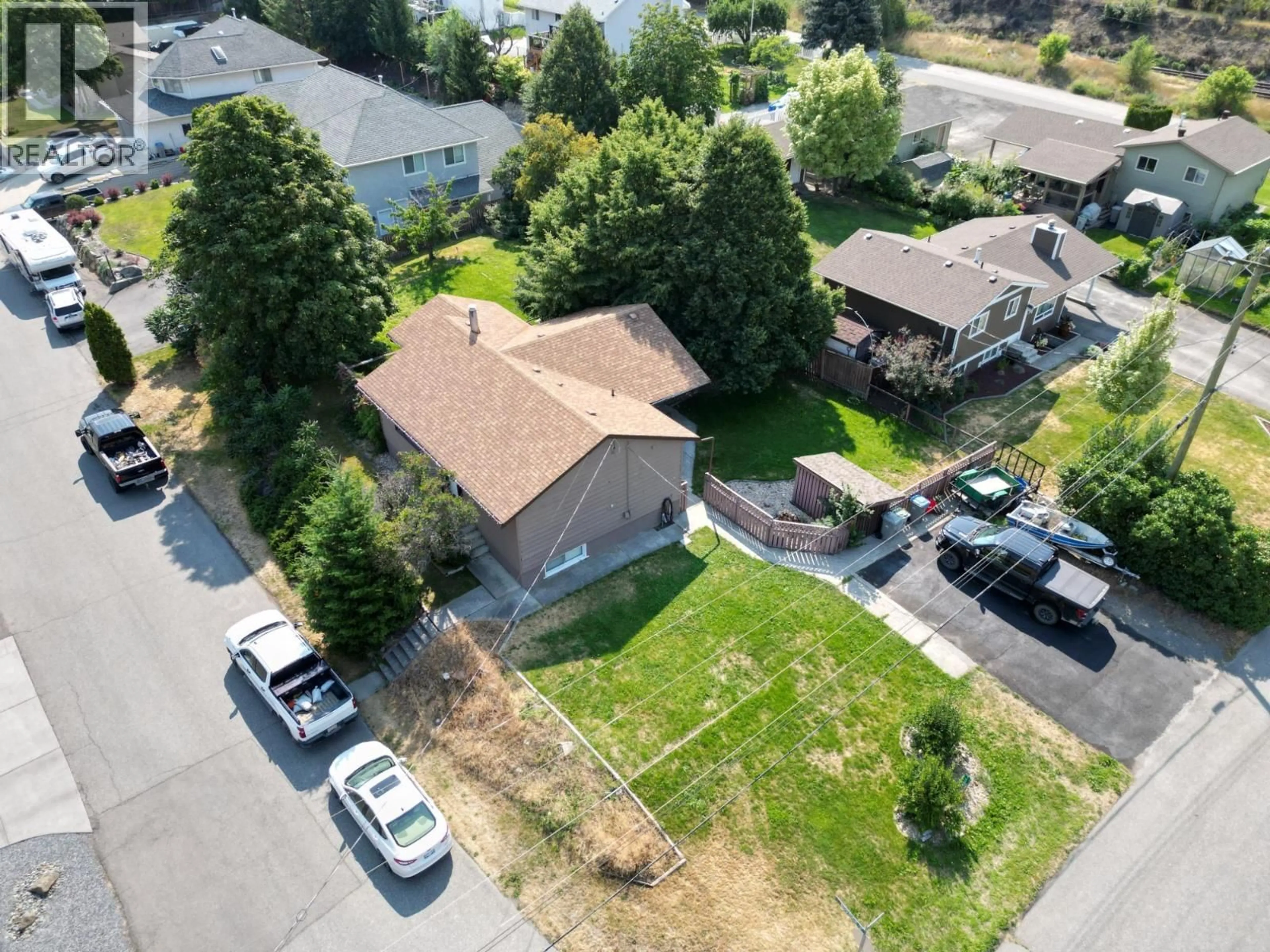 A pic from outside/outdoor area/front of a property/back of a property/a pic from drone, street for 160 PUMP ROAD, Kamloops British Columbia V2C4Y6