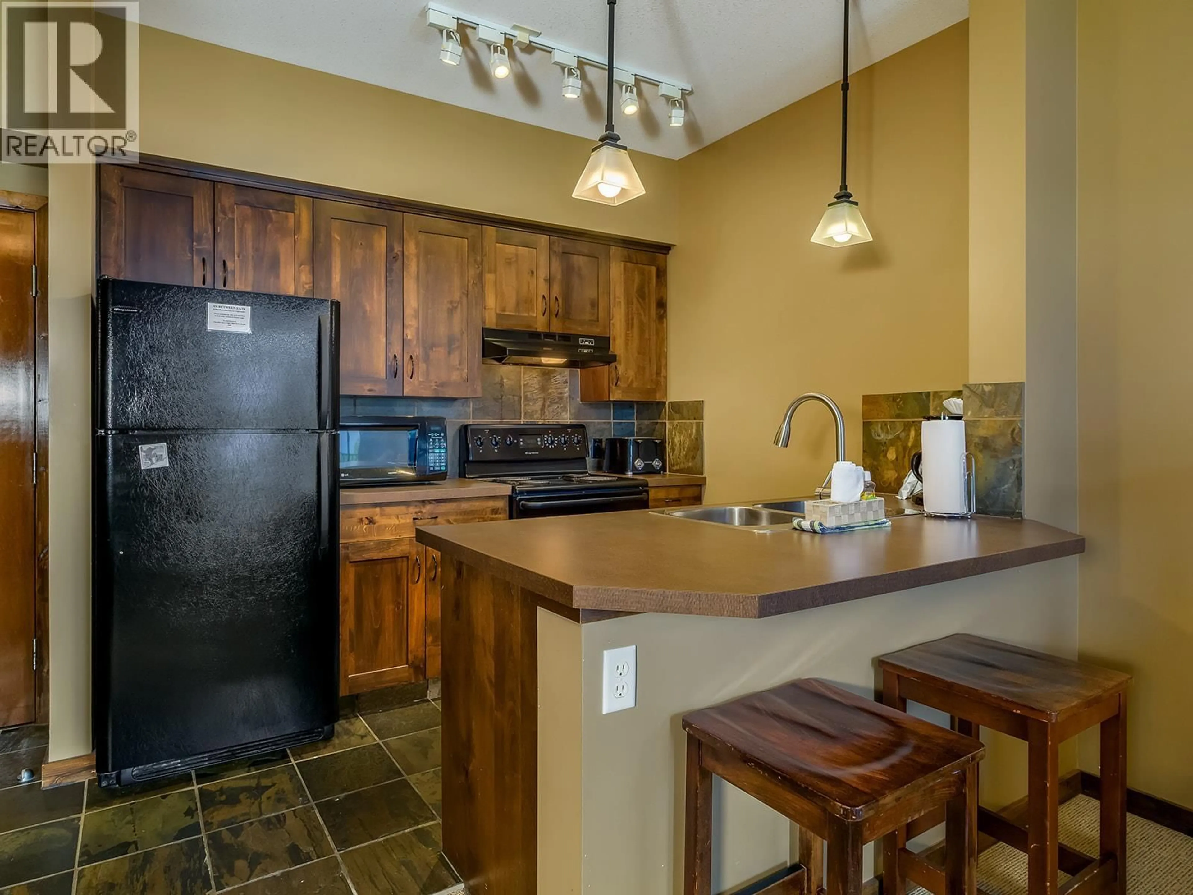Standard kitchen, ceramic/tile floor for 307 - 1545 KICKING HORSE TRAIL, Golden British Columbia V0A1H2